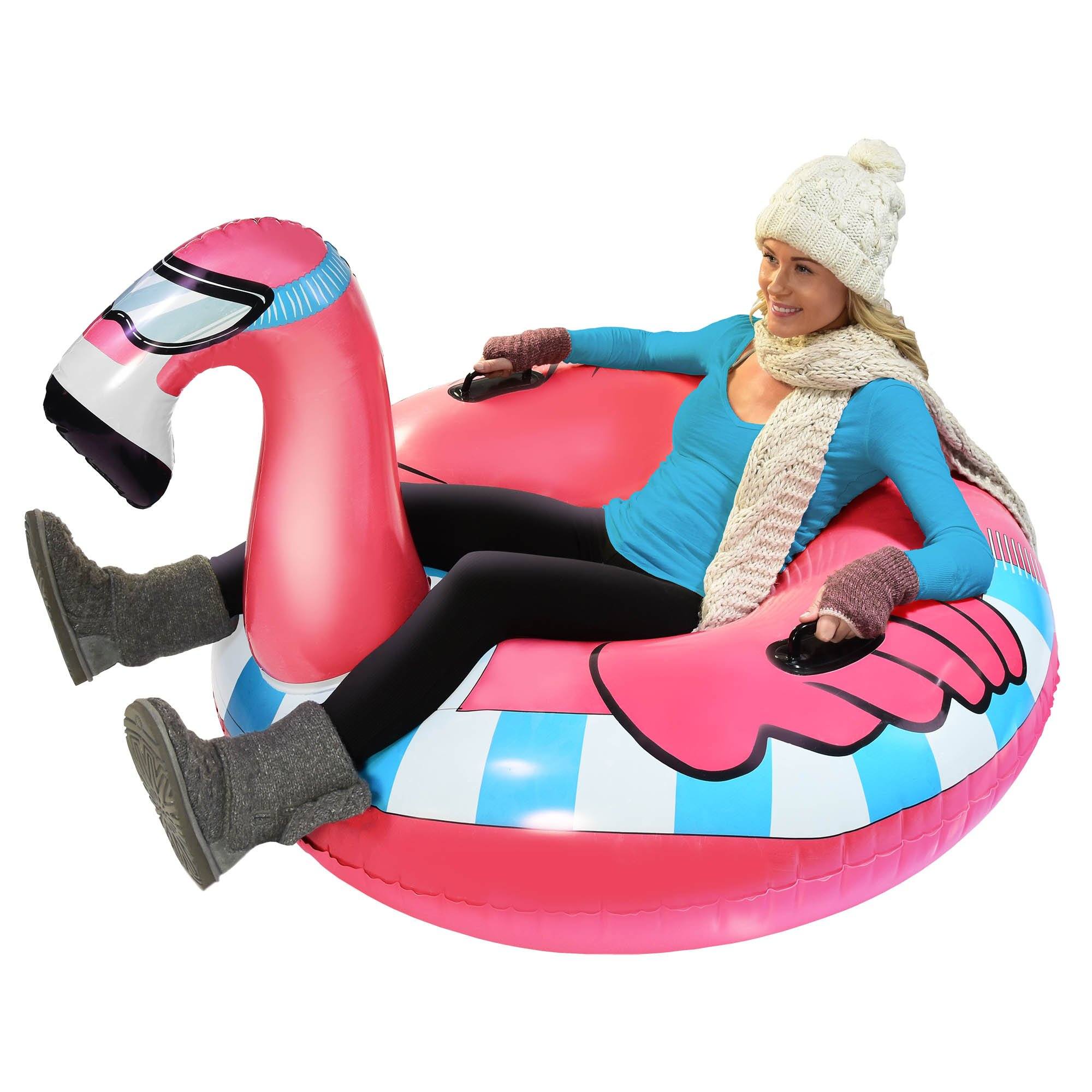 a woman sitting on an inflatable flaming