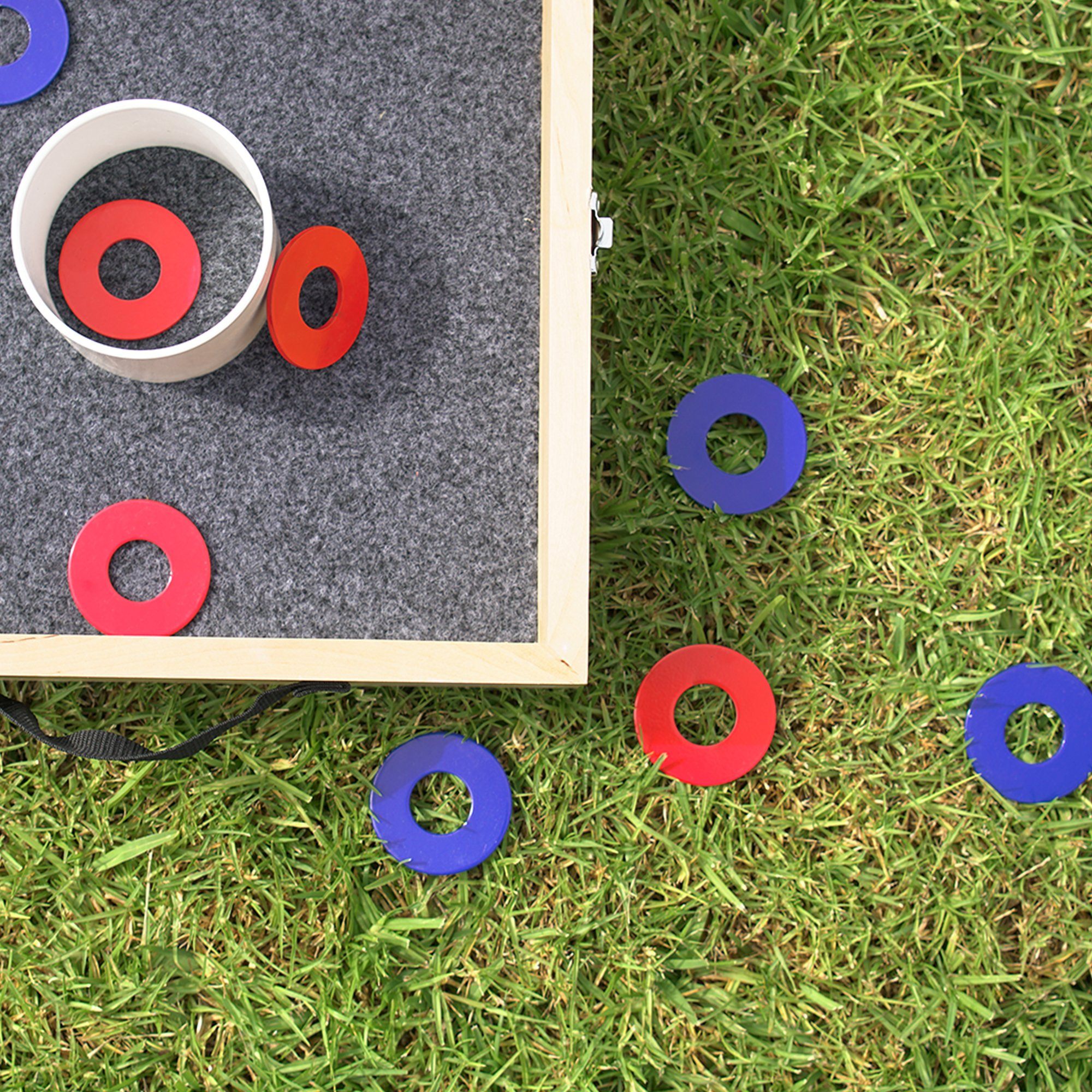 a wooden board with a red and blue ring