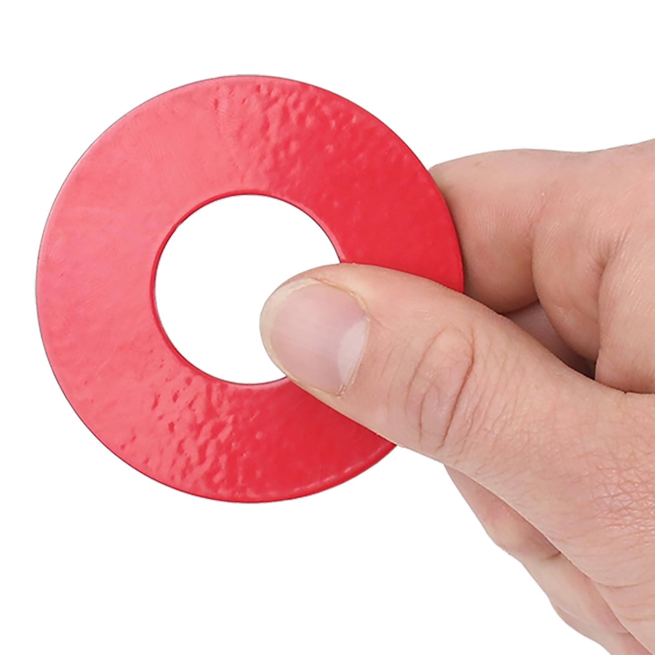 a hand holding a red circle