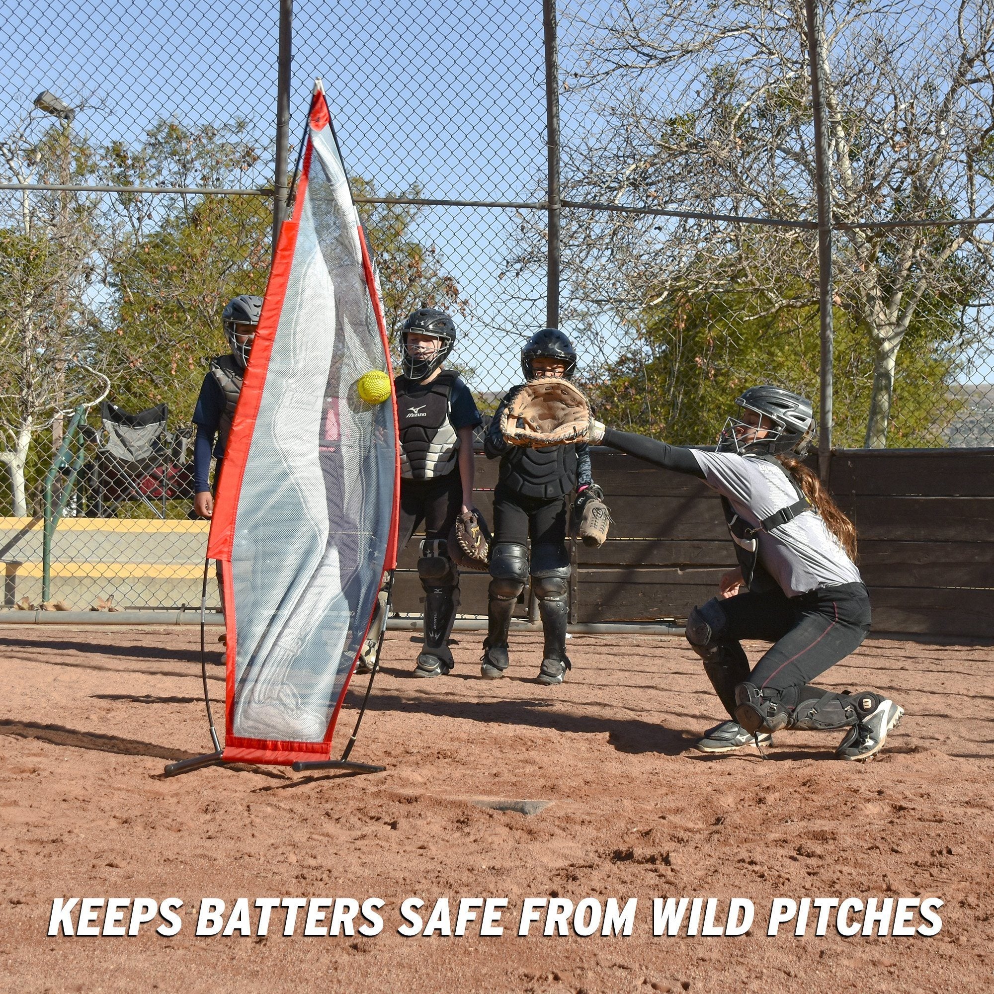 a group of people playing baseball on a field
