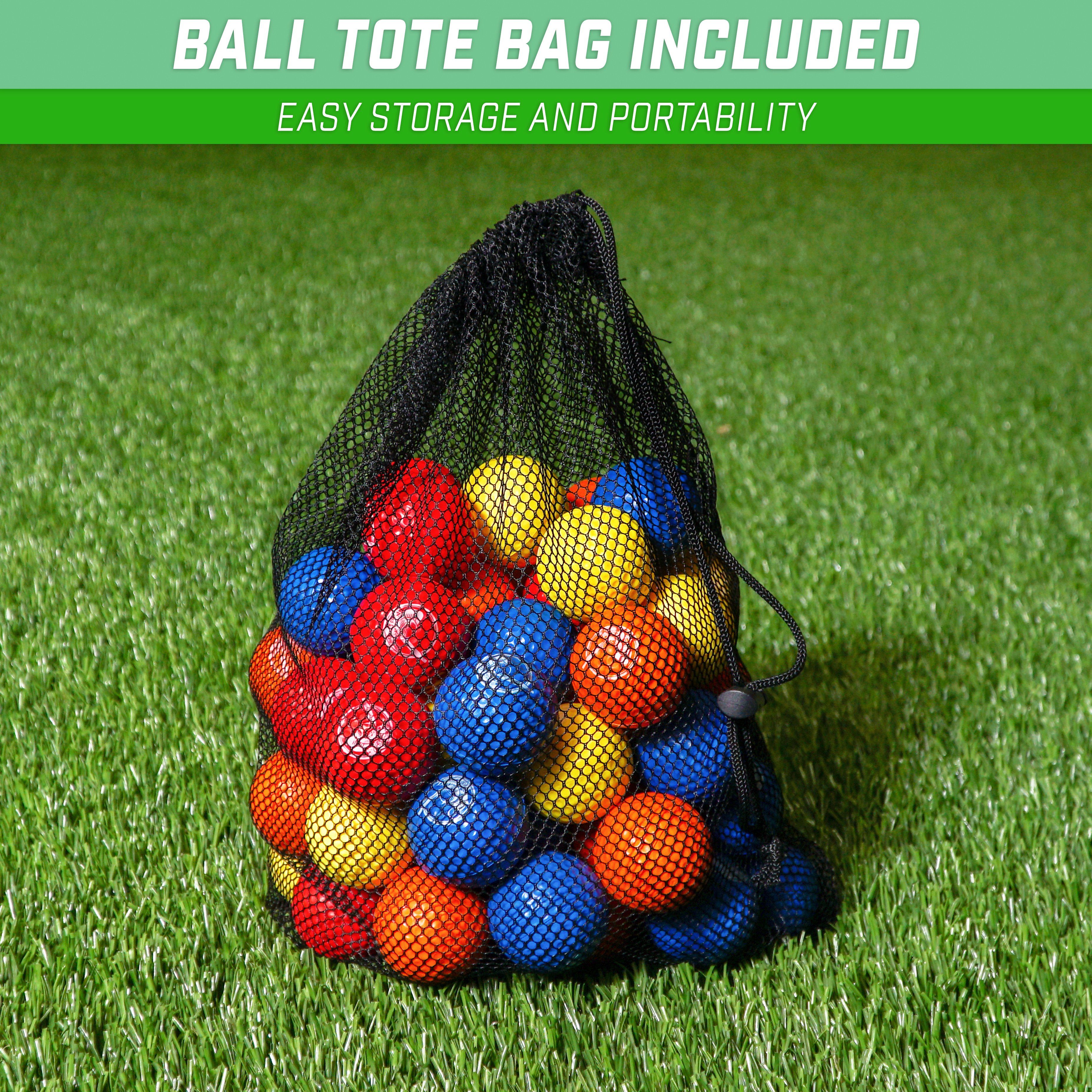 a bag full of balls on a green lawn