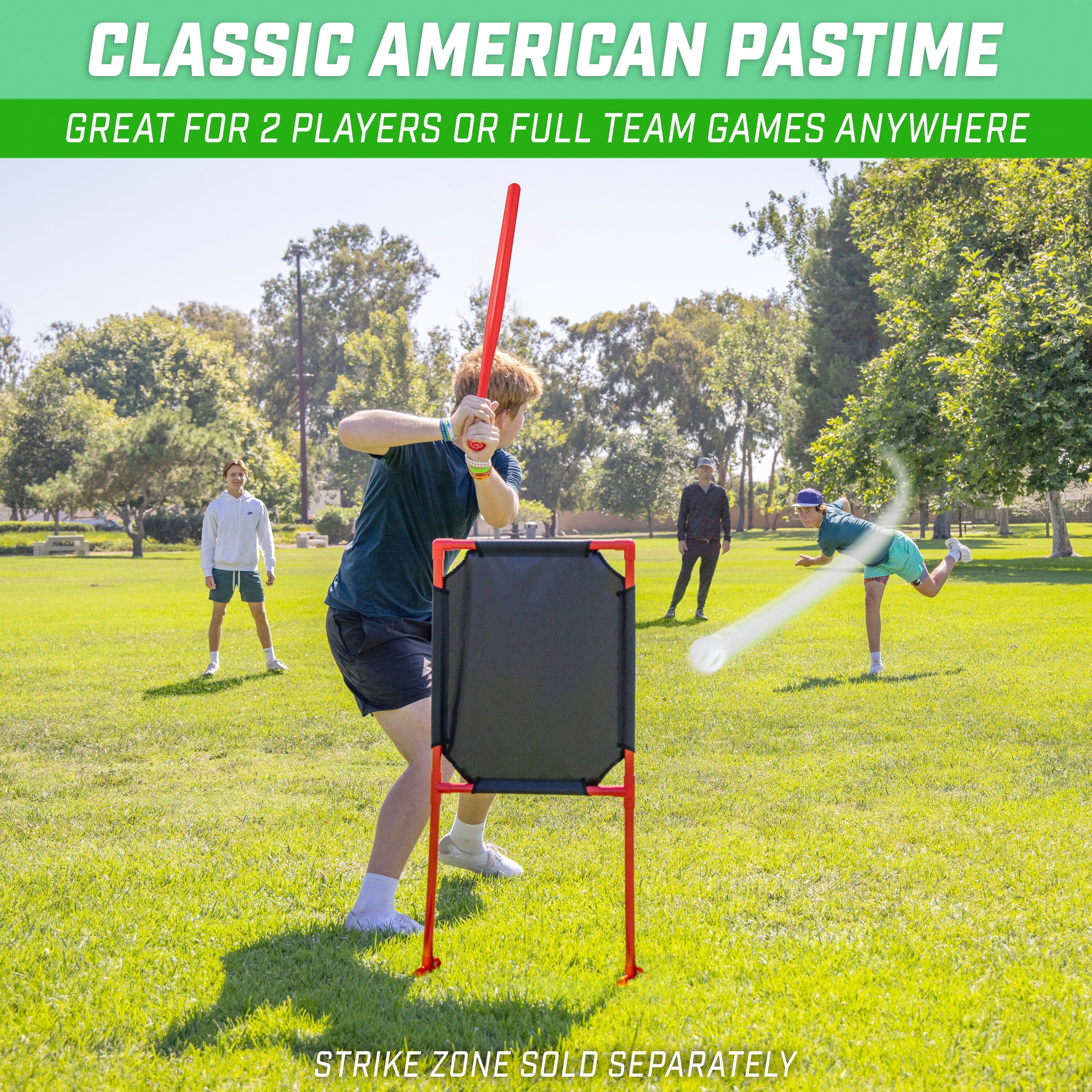 a young boy playing with a baseball bat and ball