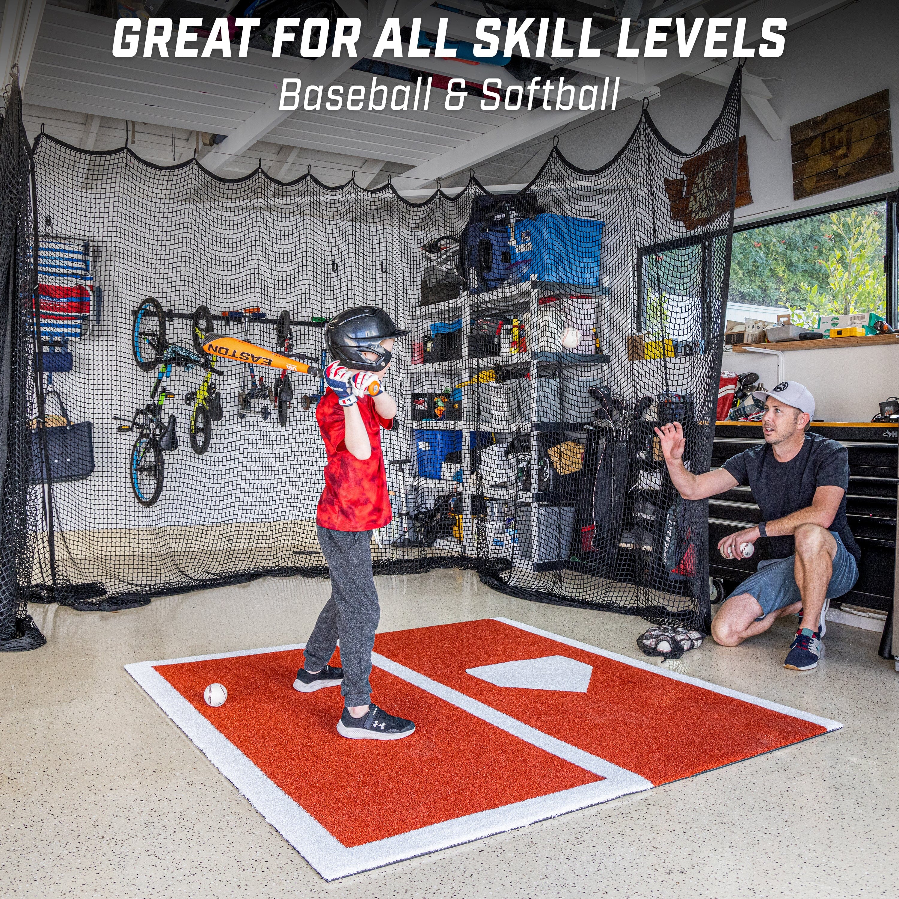 a man is practicing a baseball swing with a bat