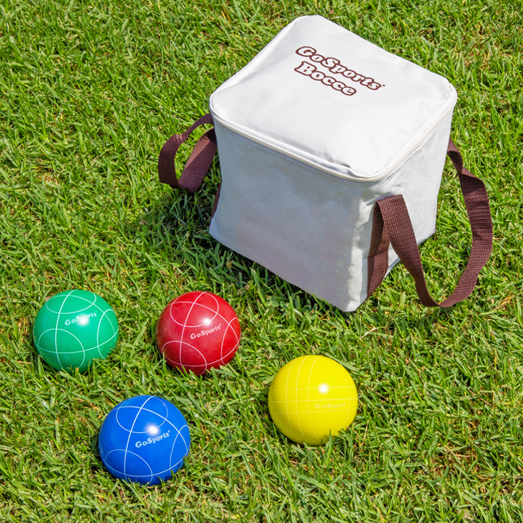 Bocce ball set with a carrying case on grass