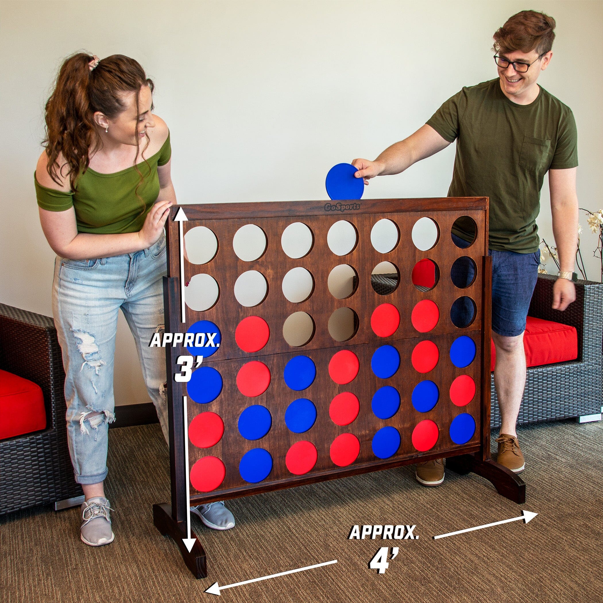 a man and woman playing a game of connect the two