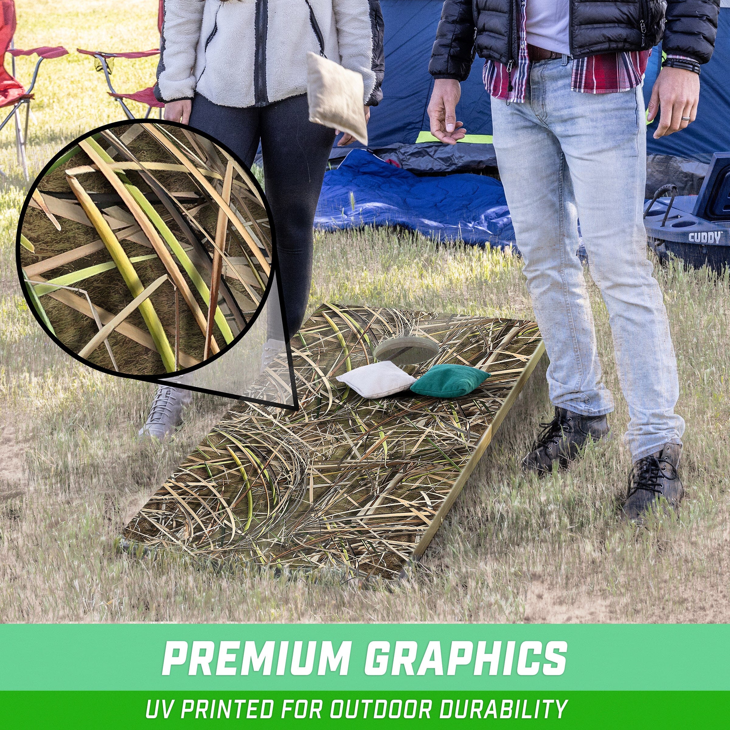 a man and woman standing next to a pile of hay