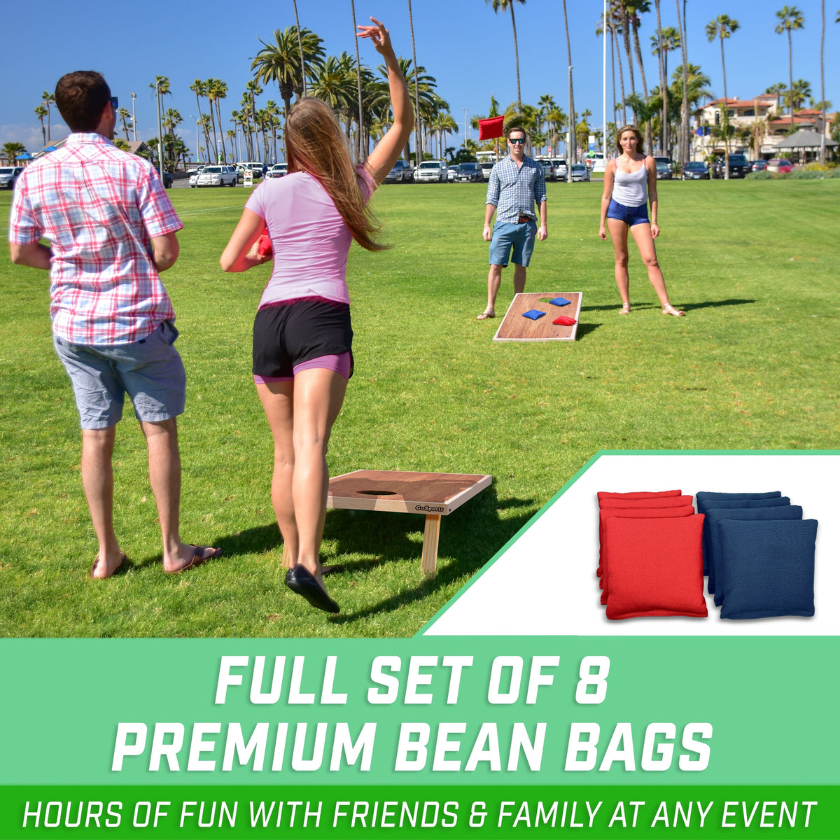 Friends playing on a park lawn with dark wood grain GoSports Craftsman cornhole boards, inset of 8 bags