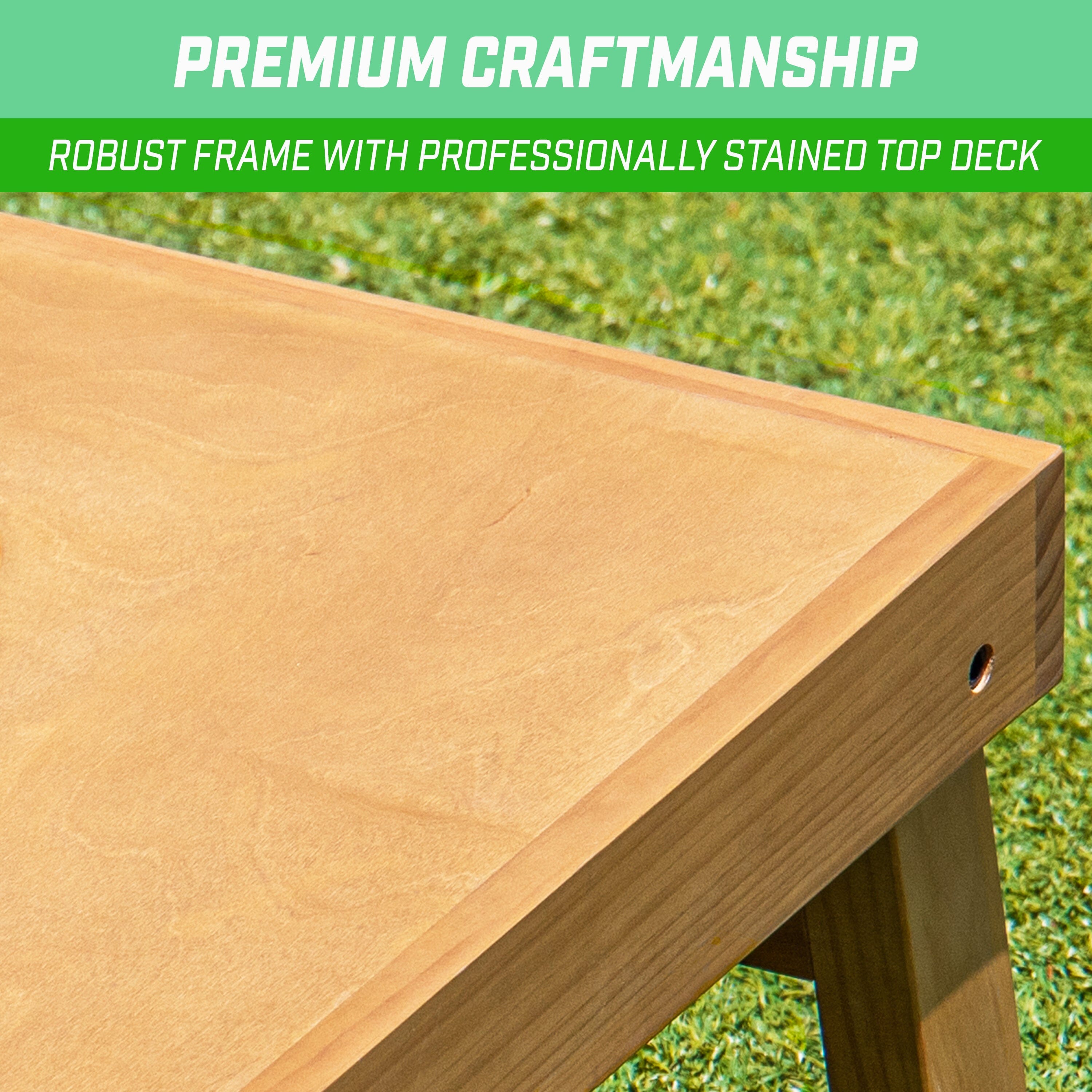 a wooden bench with a green background