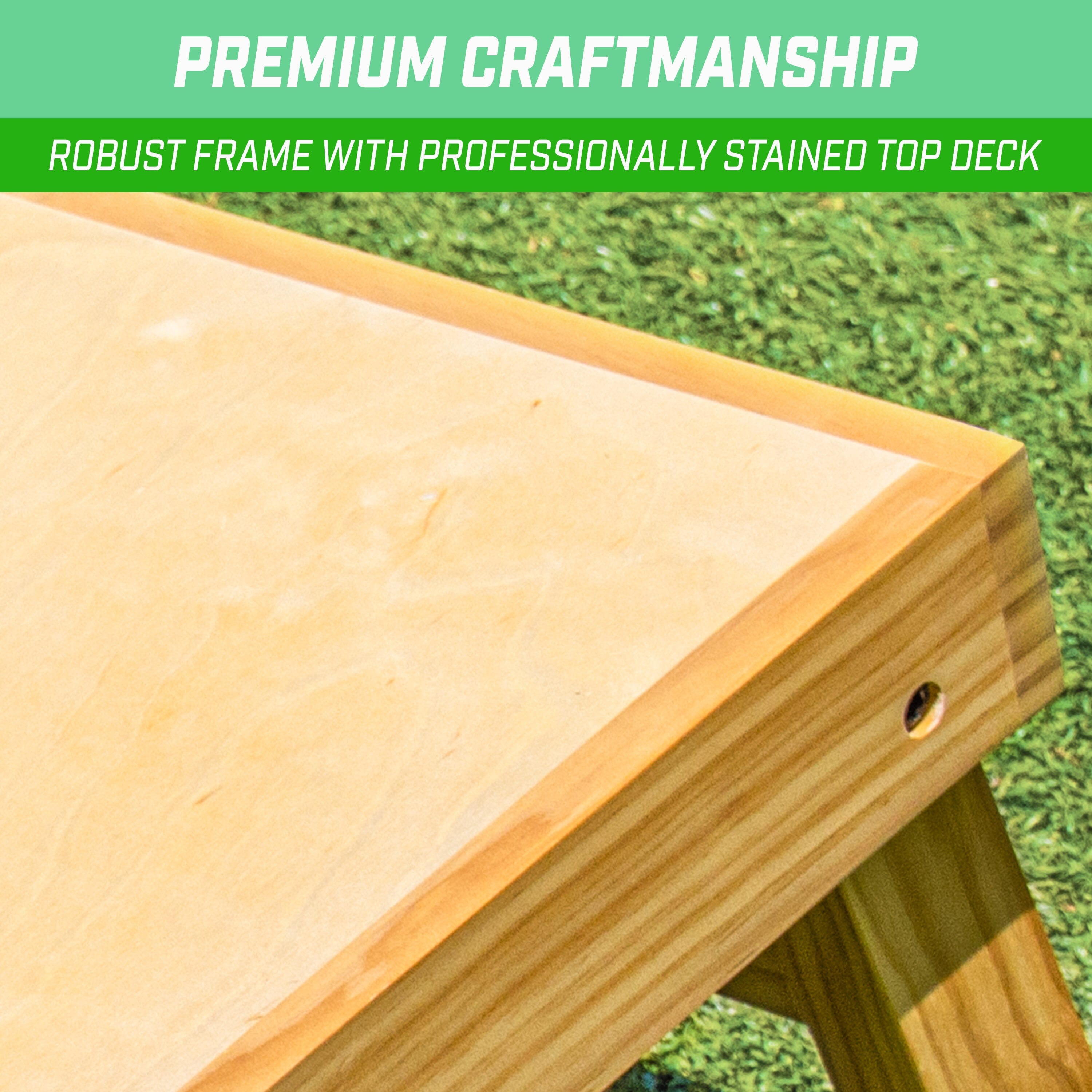 a wooden bench with a green background