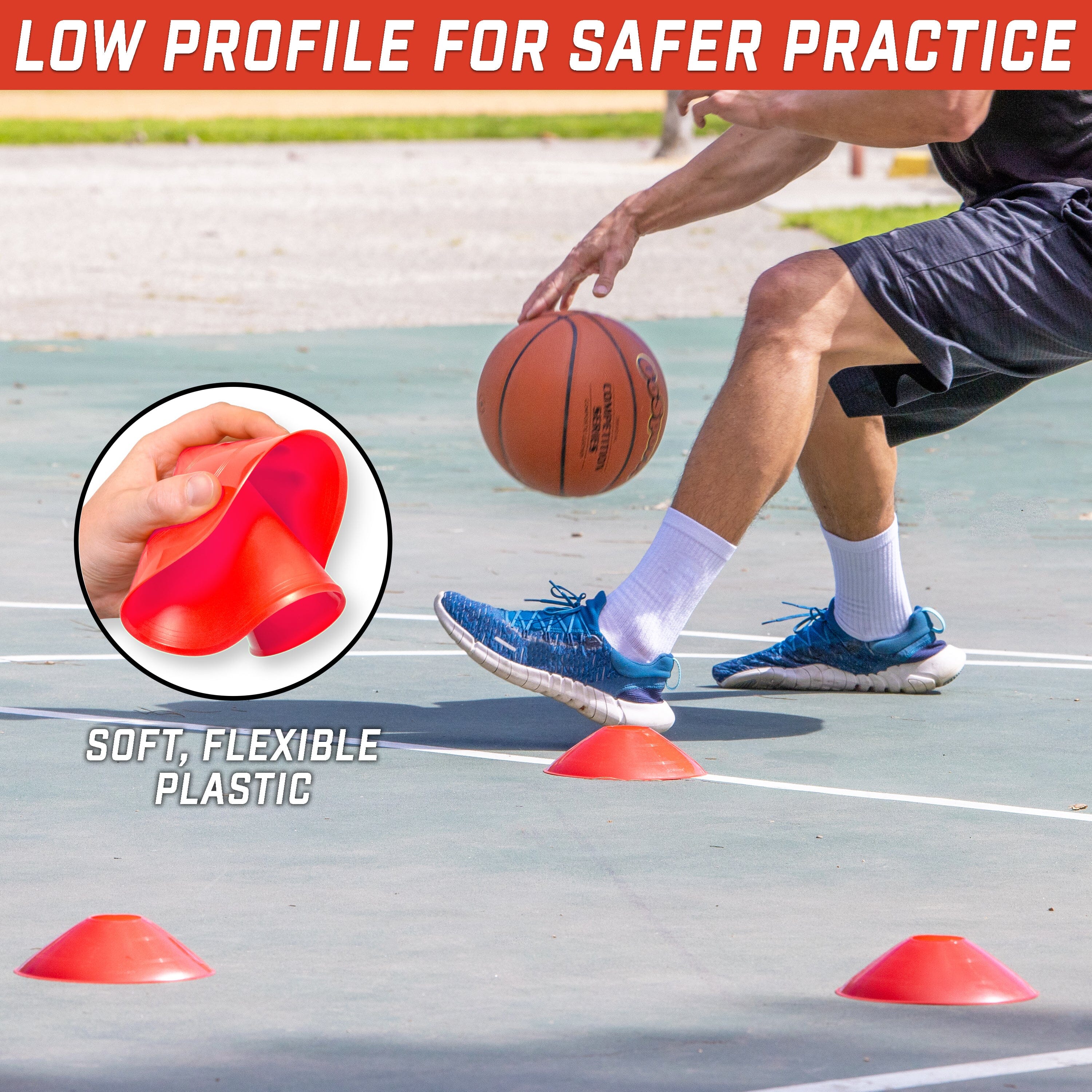 a man is playing basketball with cones on the court