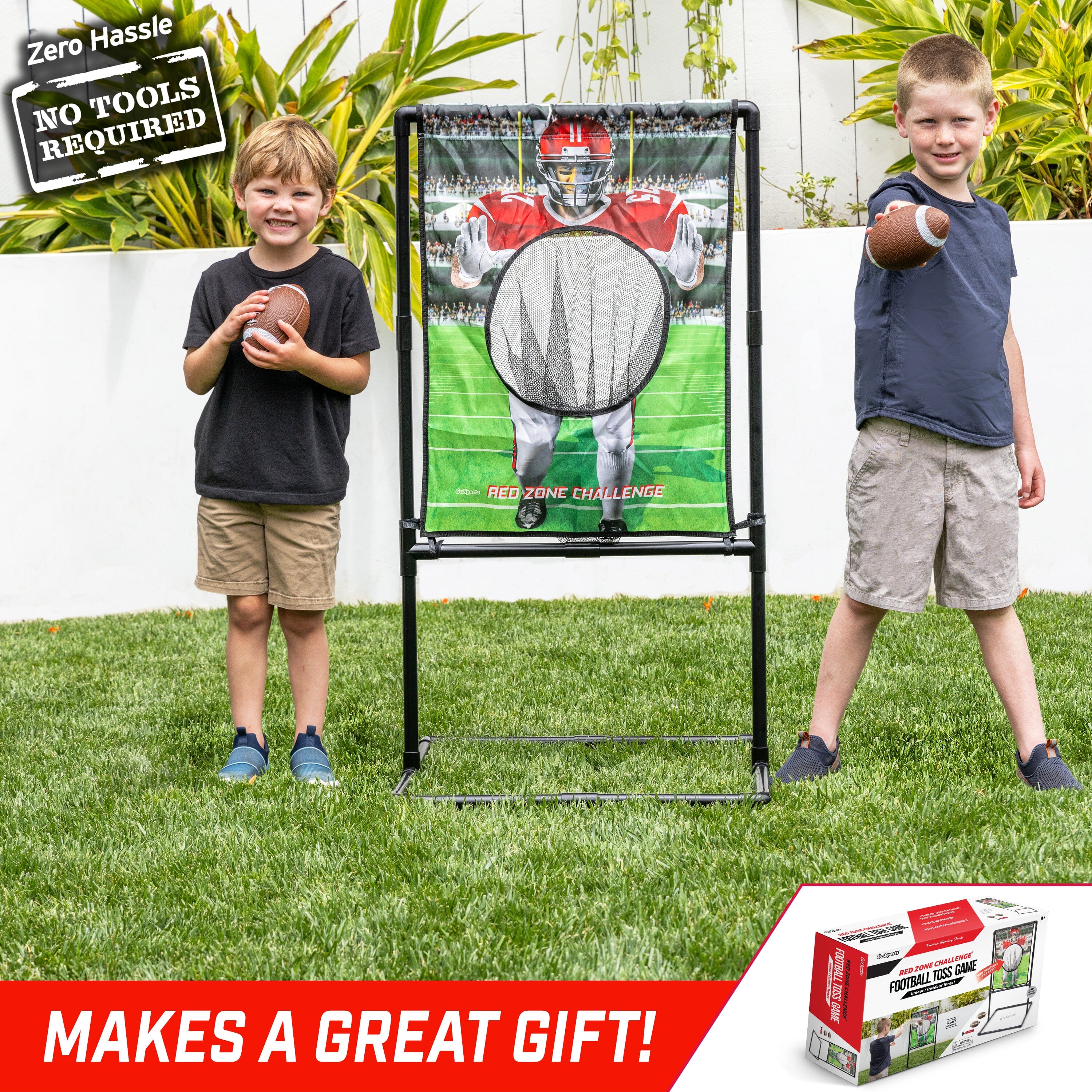 two boys standing in front of a soccer goal