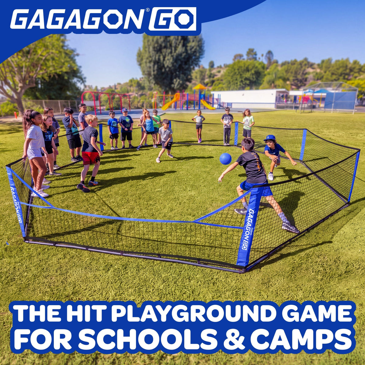Outdoor scene showing a group of children playing a soccer-style hit game on a grassy field with a large black-and-blue GAGAGON GO net. The GAGAGON GO logo appears at the top left, and text at the bottom reads 'THE HIT PLAYGROUND GAME FOR SCHOOLS & CAMPS.