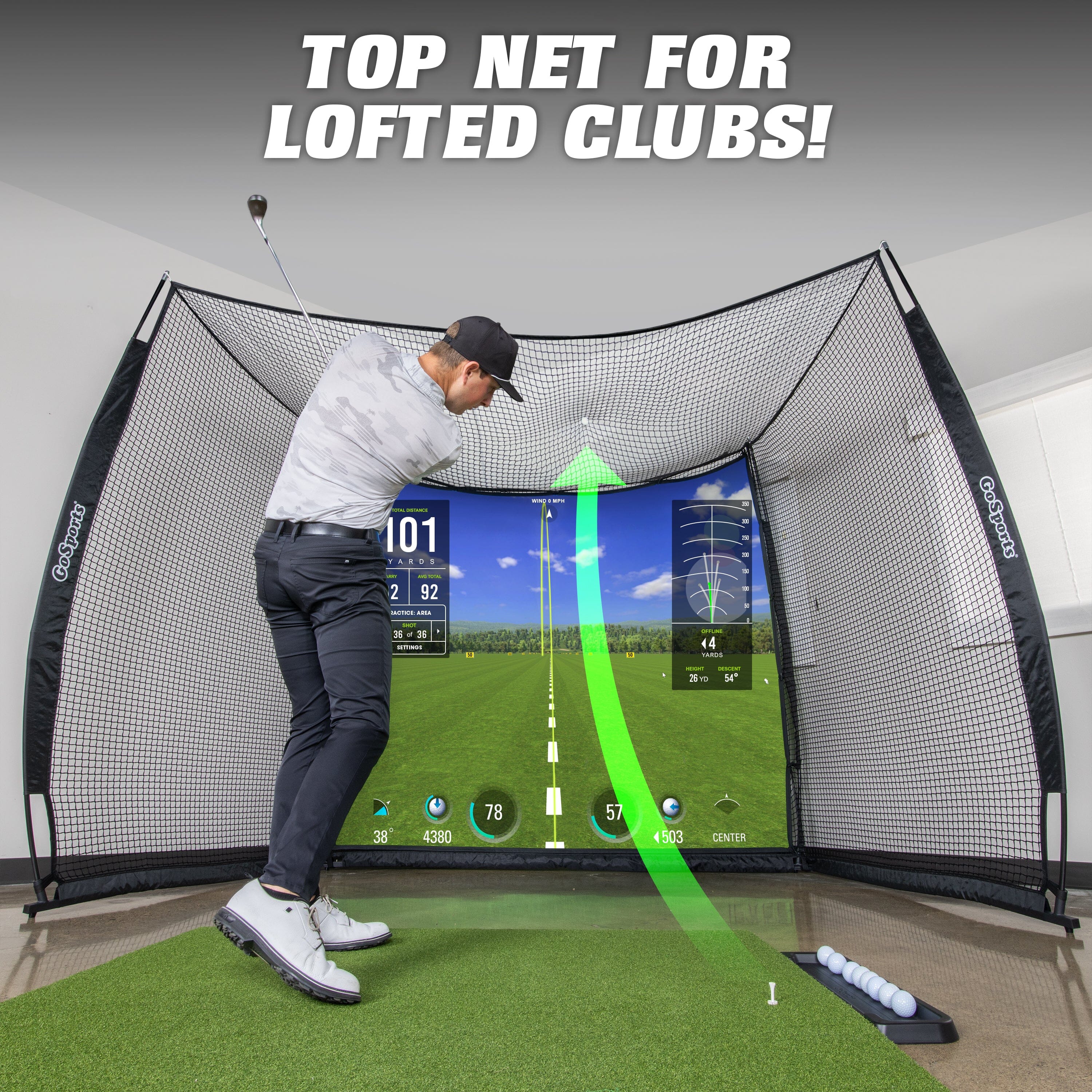 a man hitting a golf ball in a golf simulator