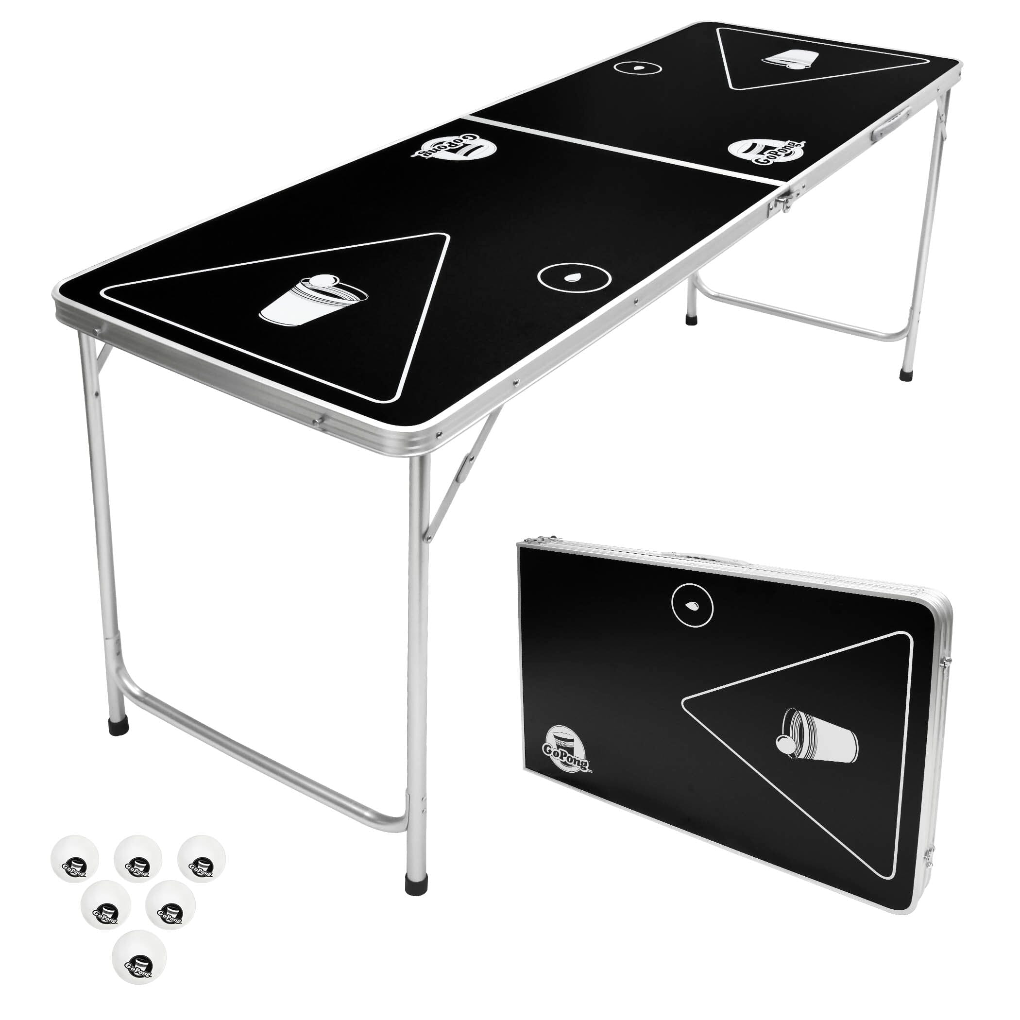 a table with a foldable small table and two balls