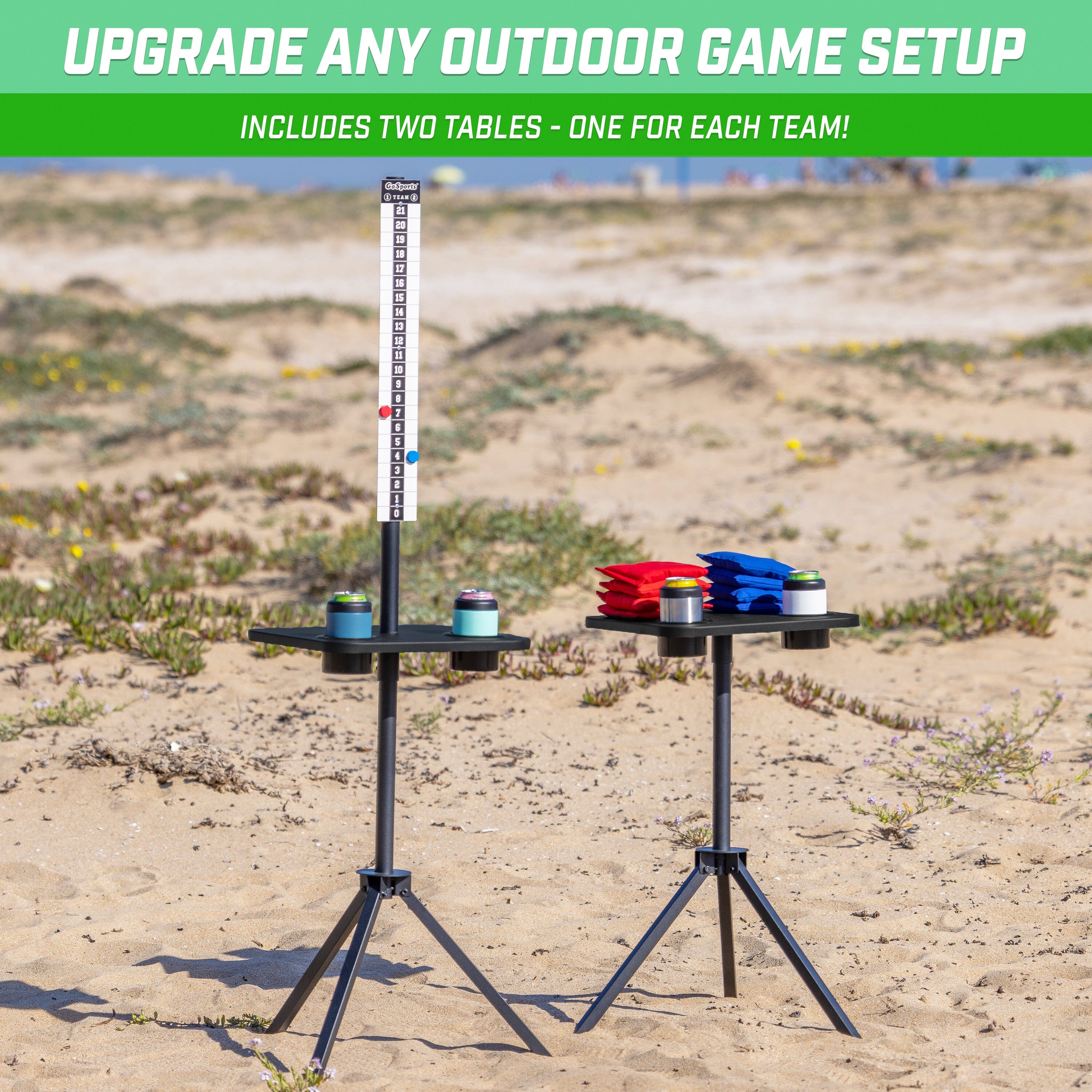 a pair of portable game stands on a sandy beach