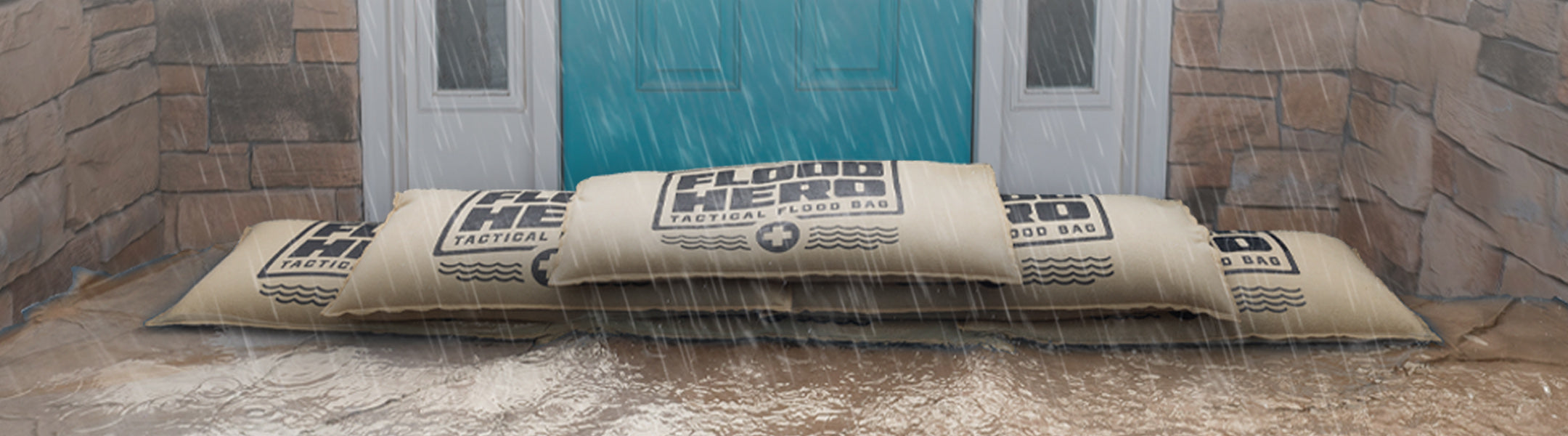 Beige bag labeled 'Flood Hero' on a wet floor with a door in the background
