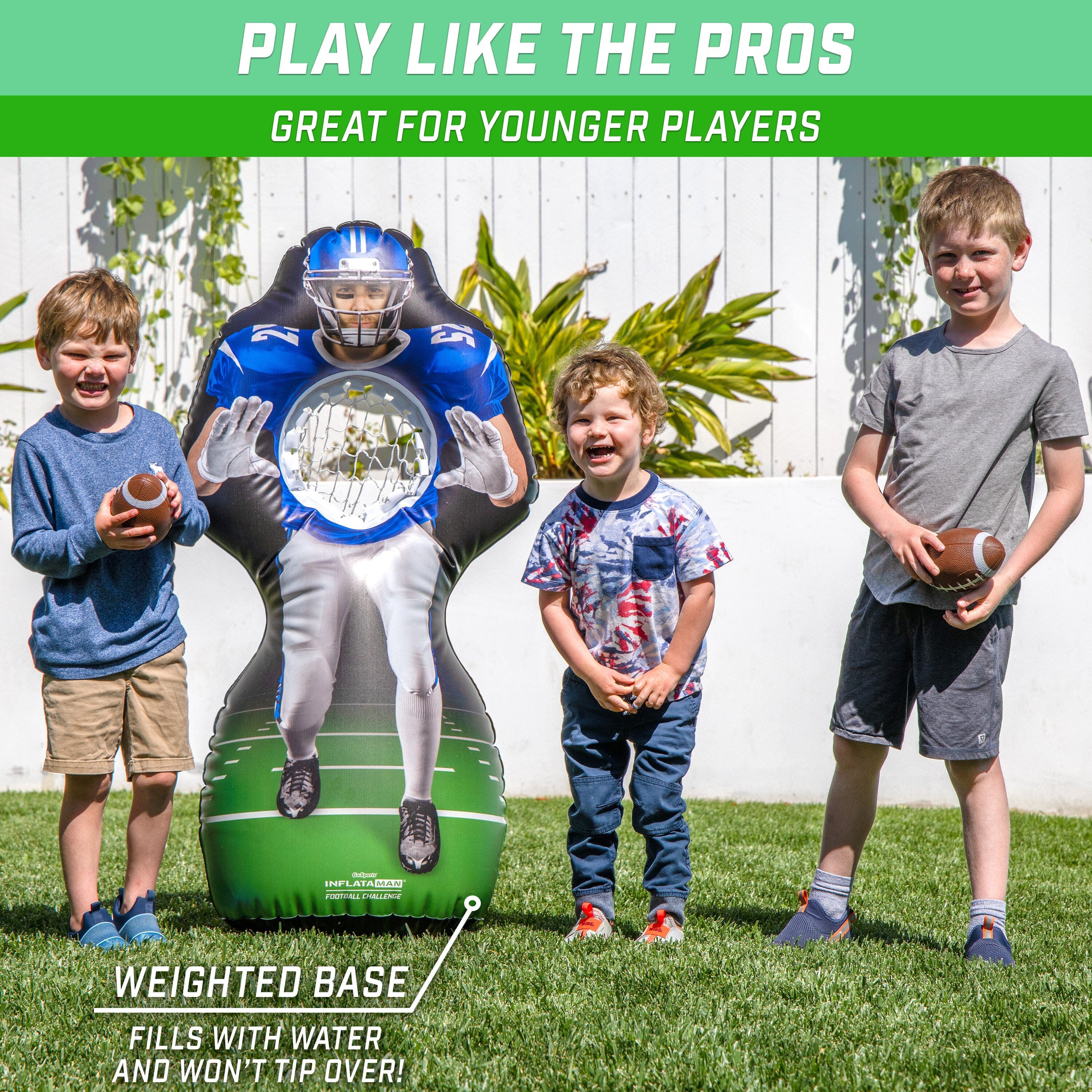 a group of children playing with a giant inflatable