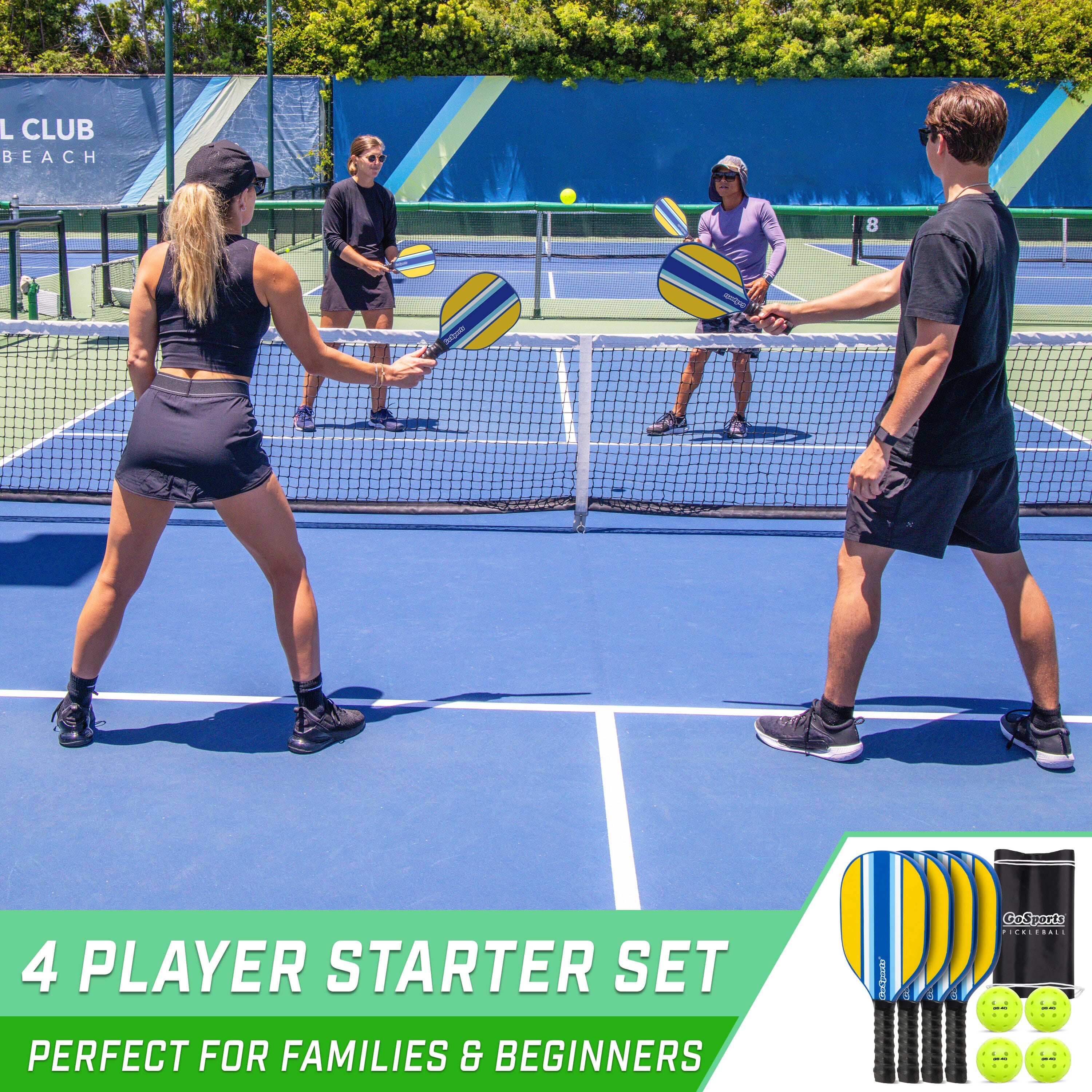 a couple of people playing tennis on a tennis court