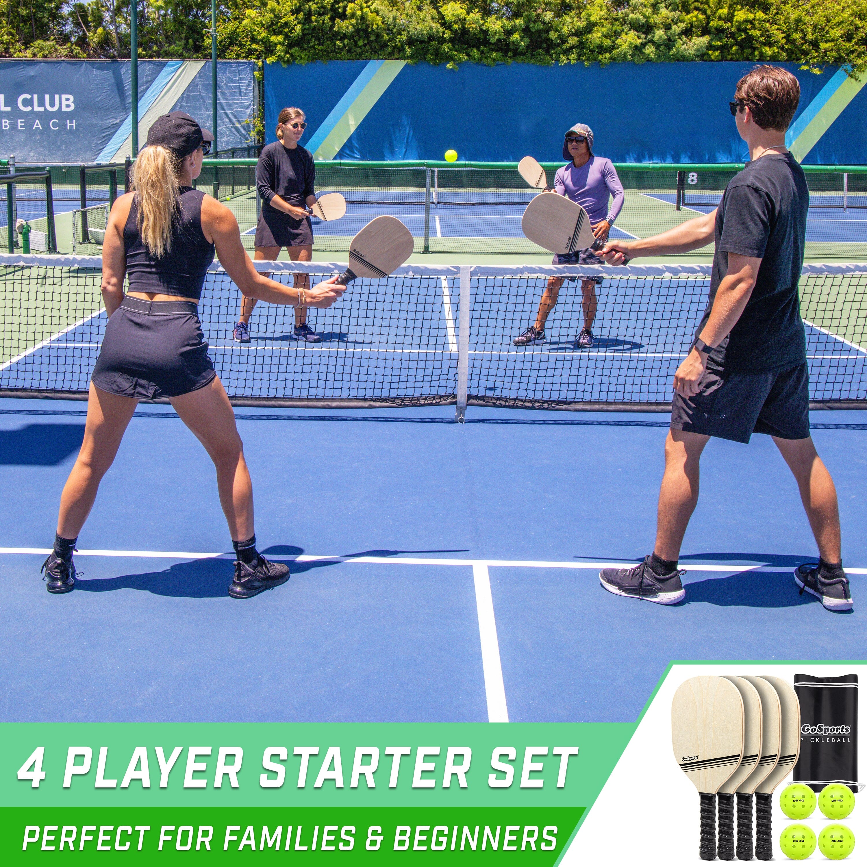 a couple of people playing tennis on a tennis court