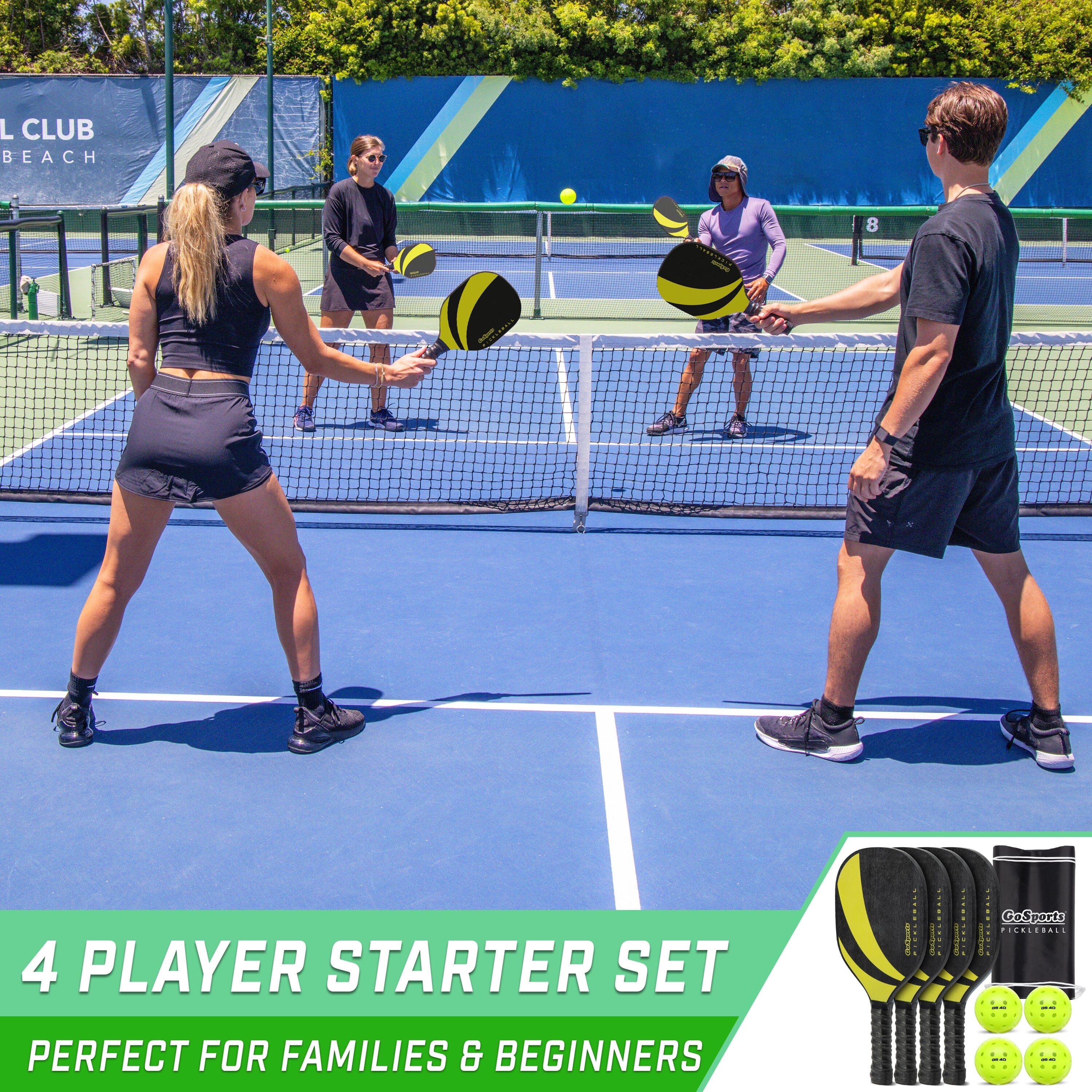 a couple of people playing tennis on a tennis court