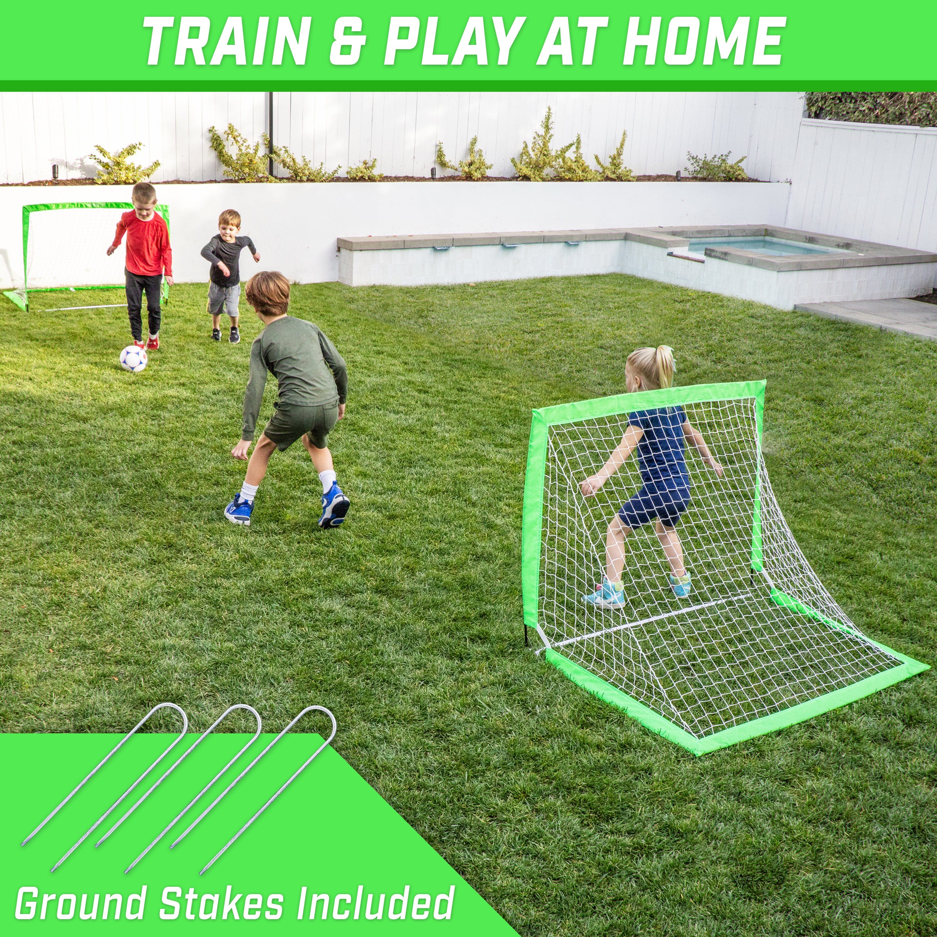 Children playing soccer with a goal on a grassy area, with text 'Train & Play at Home' and 'Ground Stakes Included'.