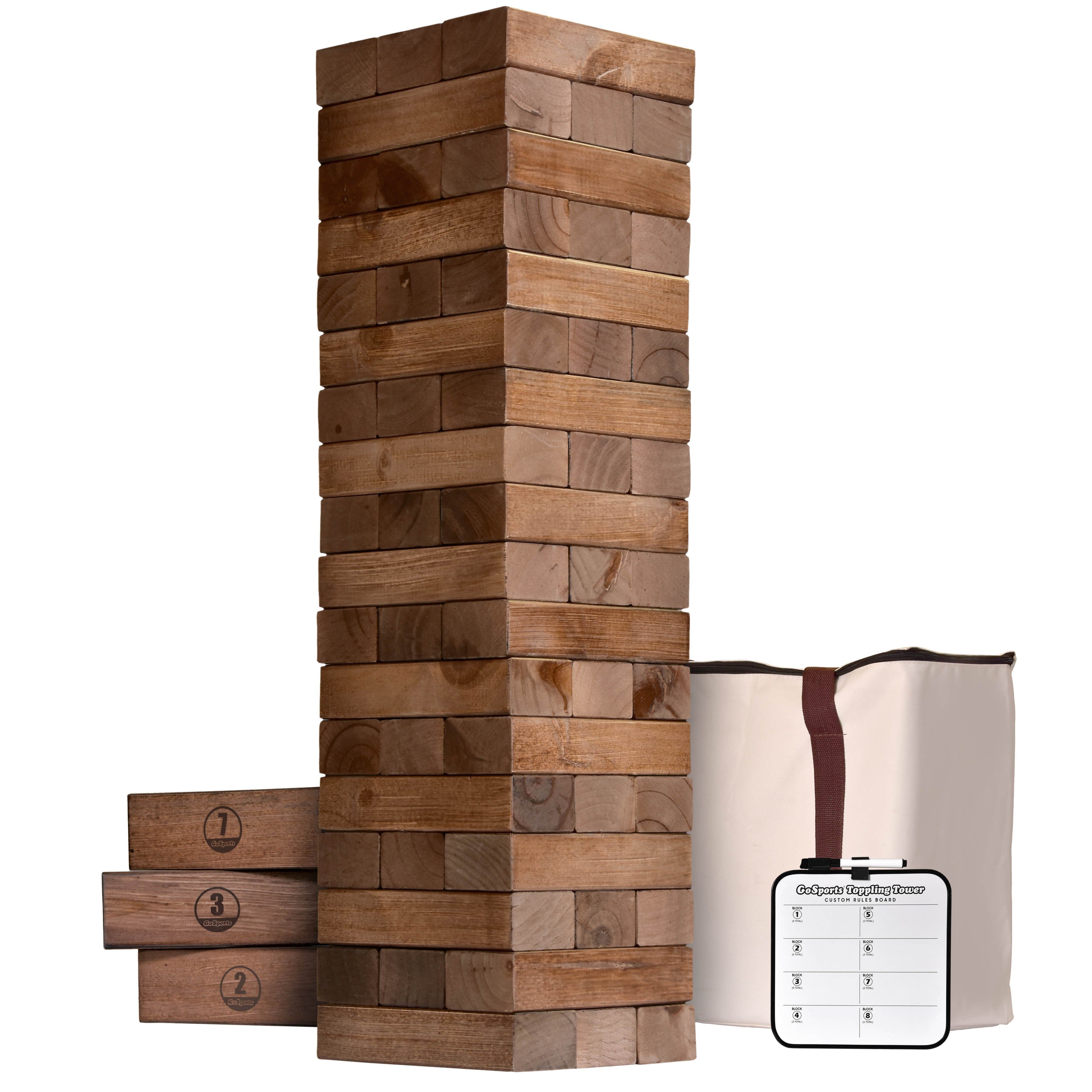 a stack of wooden blocks with a remote control