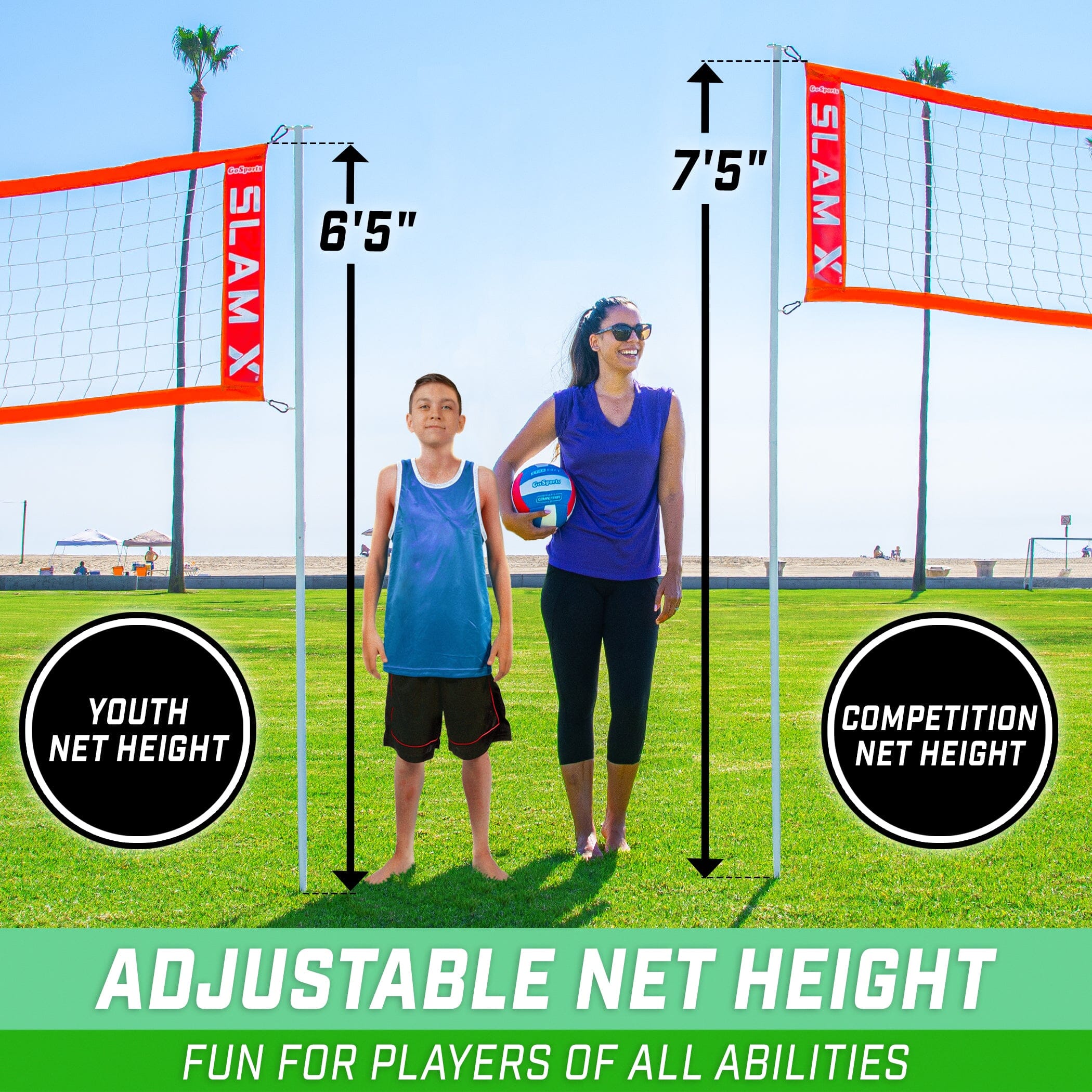 a woman and a child playing volleyball on a field