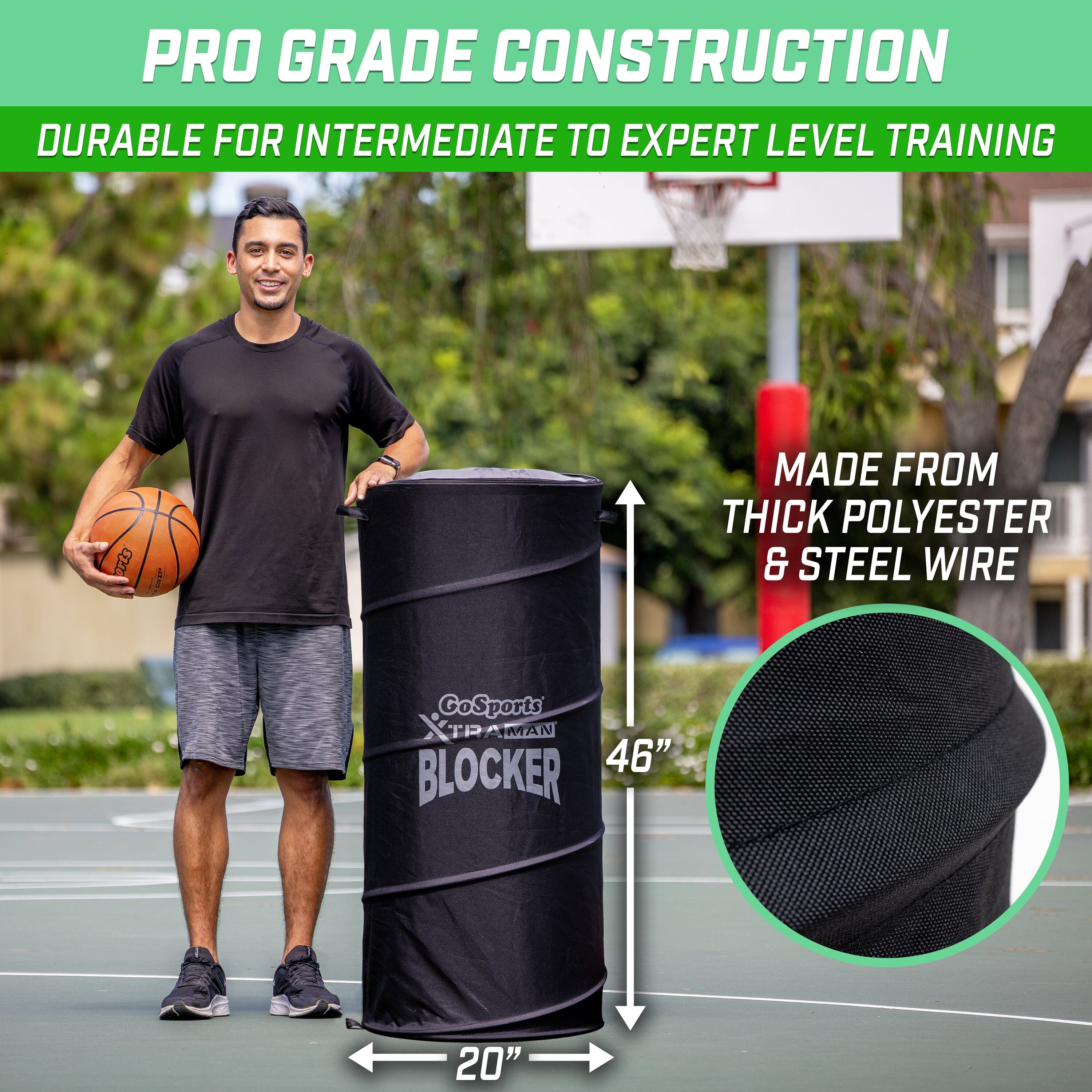 a man holding a basketball ball and a basketball bag