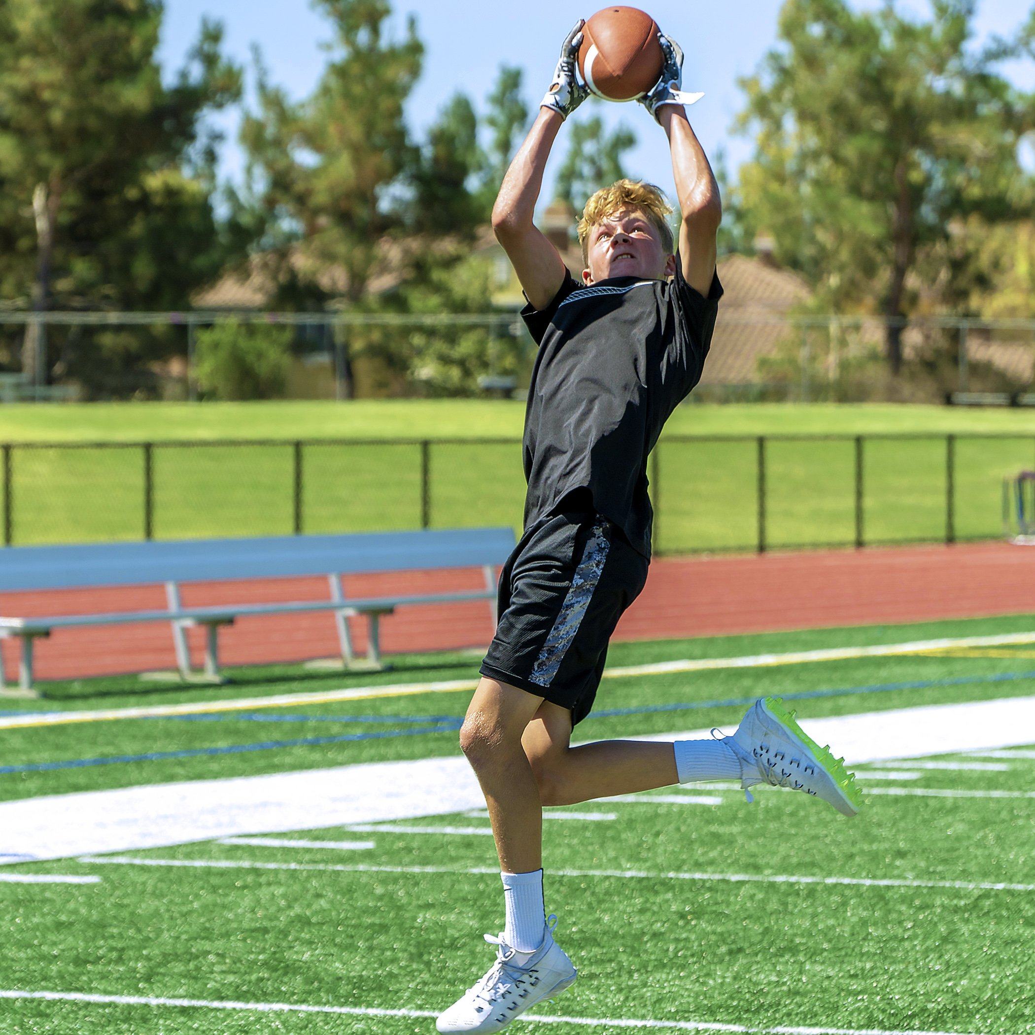 a man catching a football