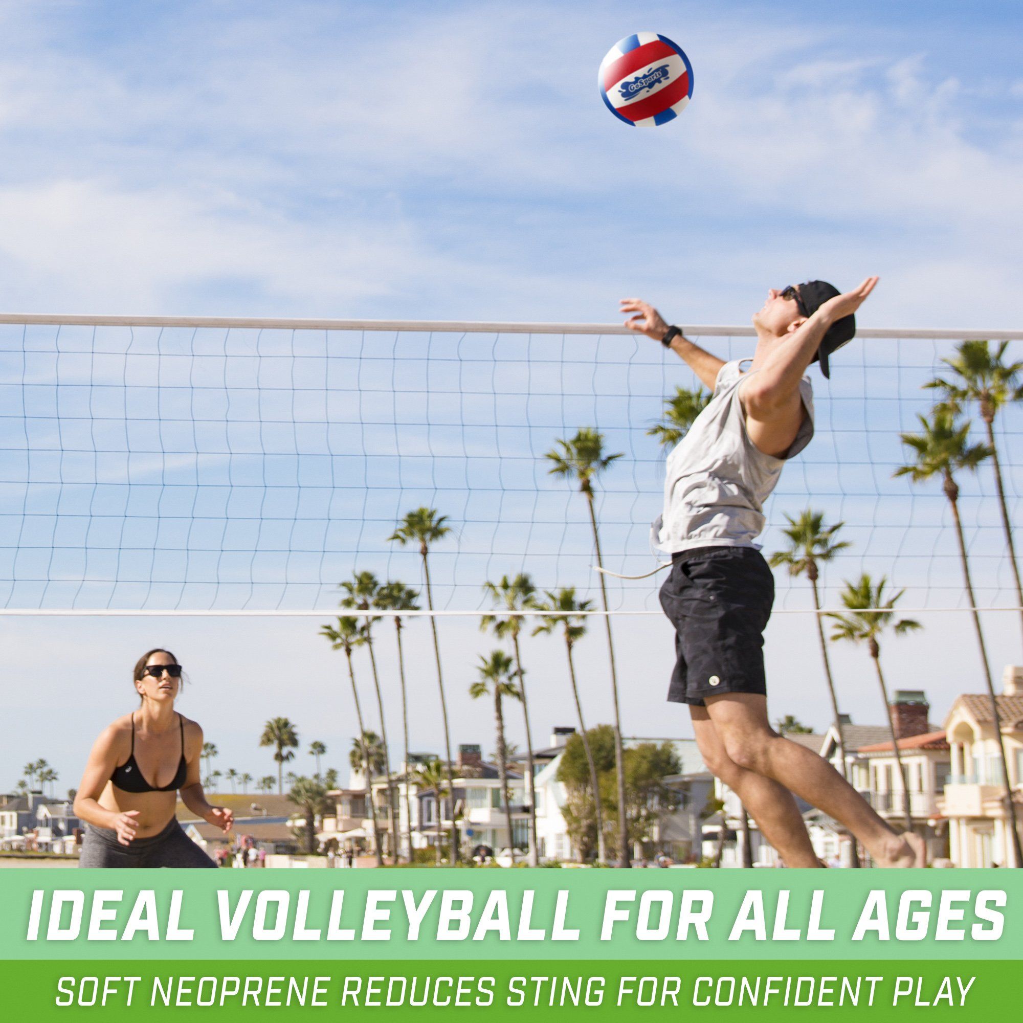 a man jumping to hit a volleyball ball