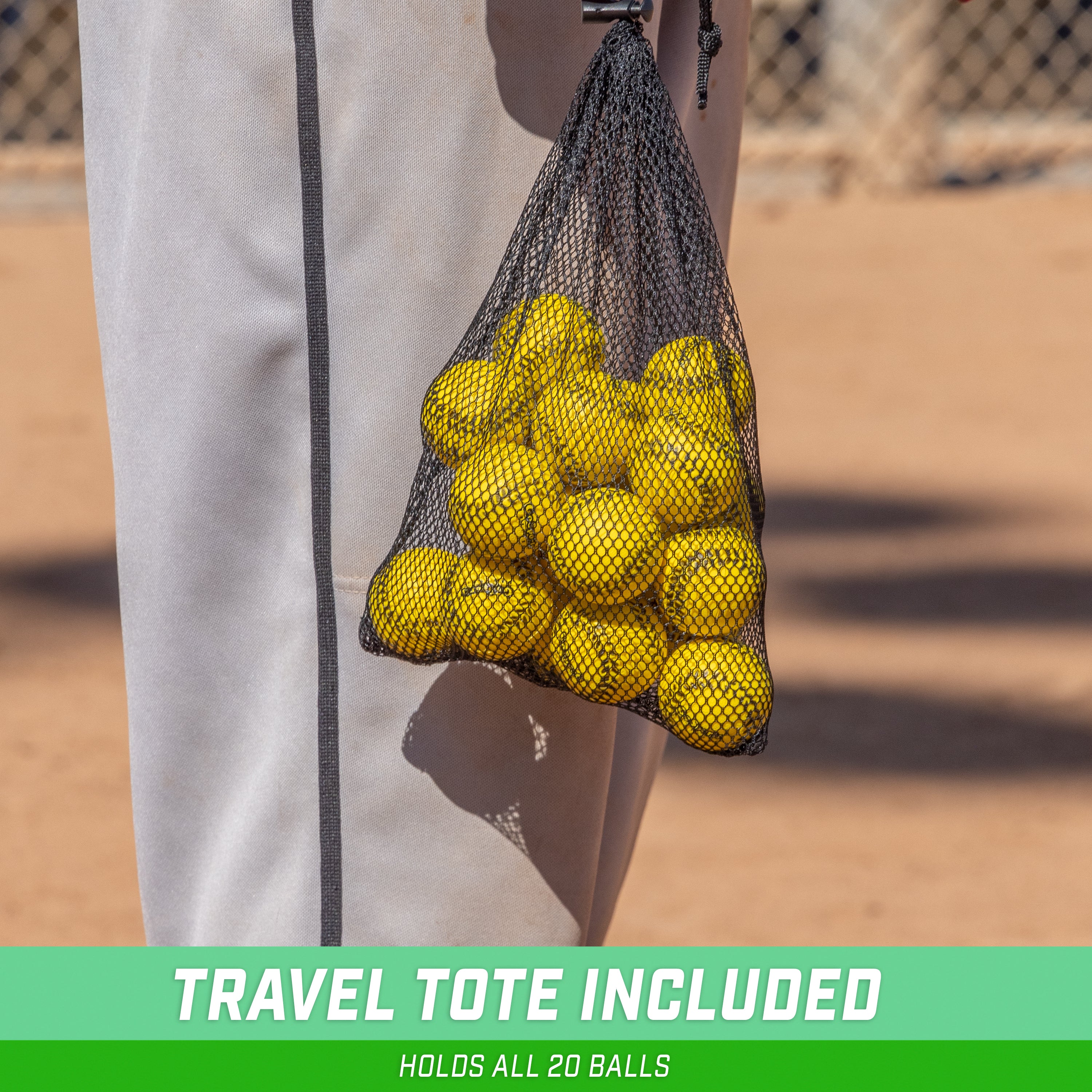 a person holding a mesh bag full of yellow tennis balls