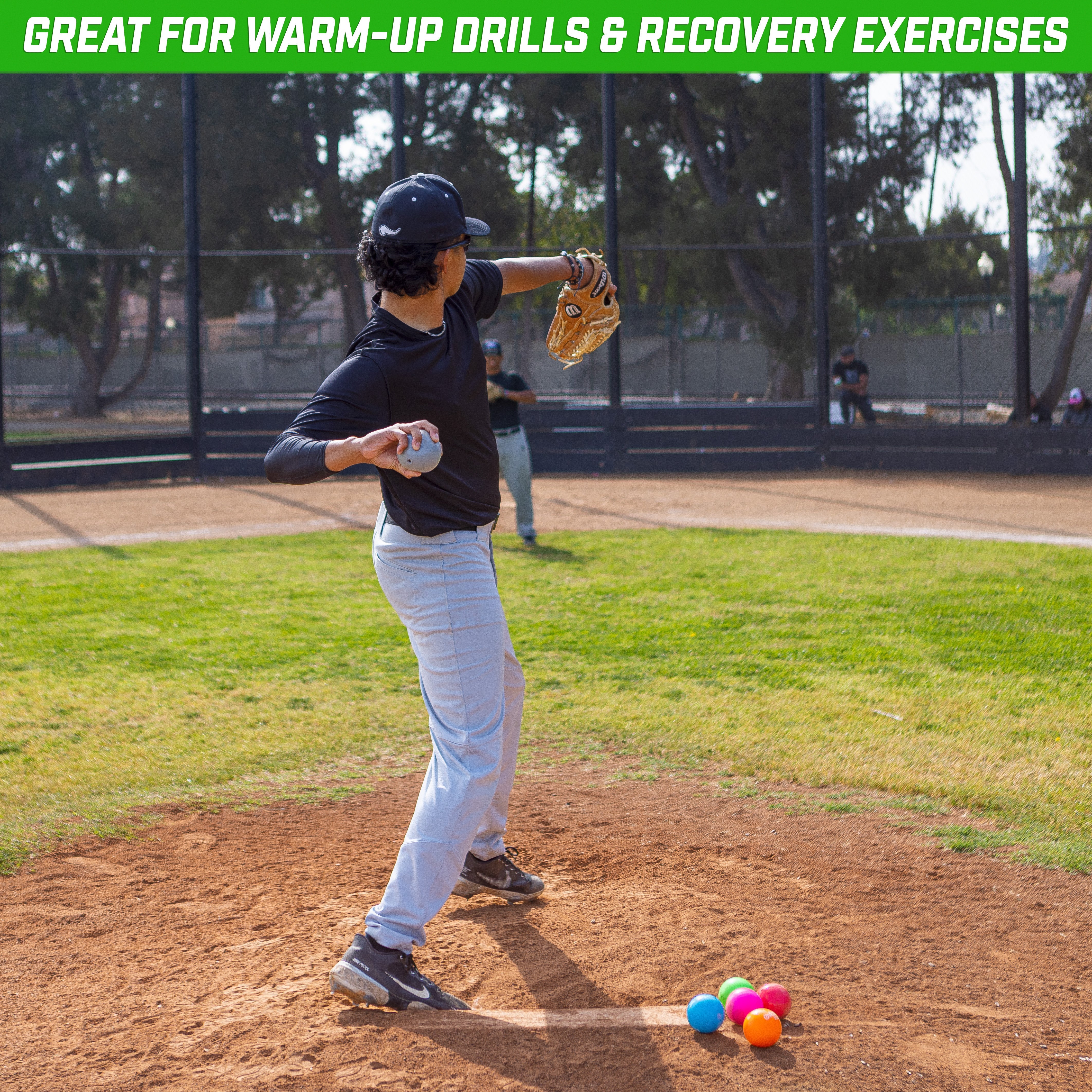 a young boy is playing baseball on a field