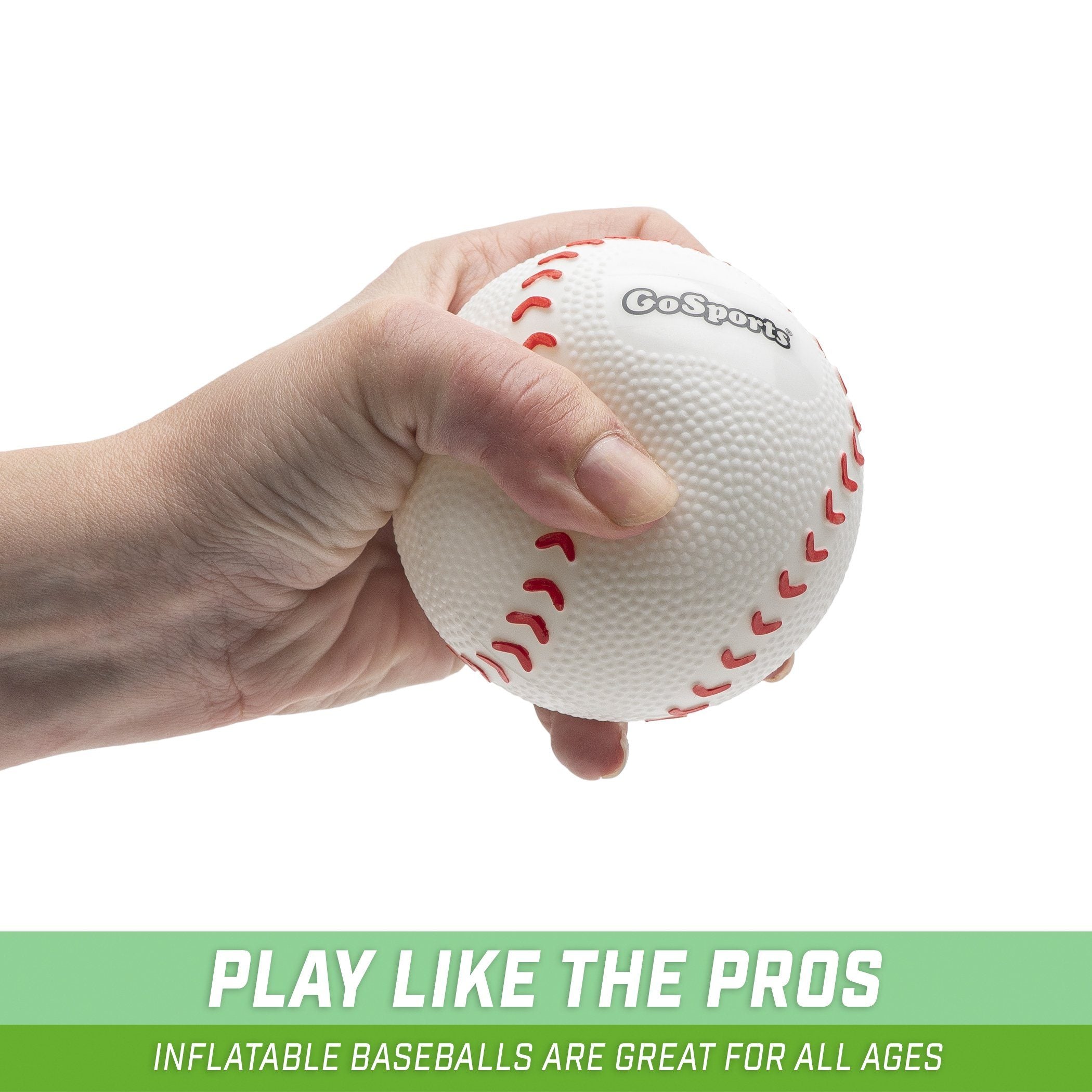 a hand holding a white ball with red and green spe