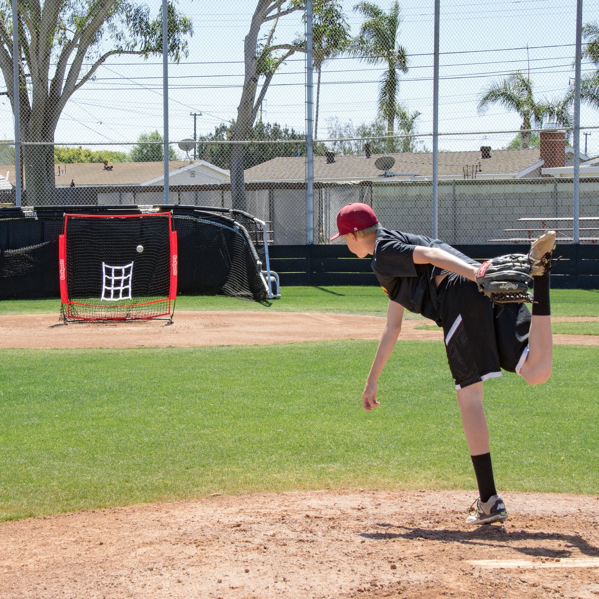 a baseball player is throwing a ball