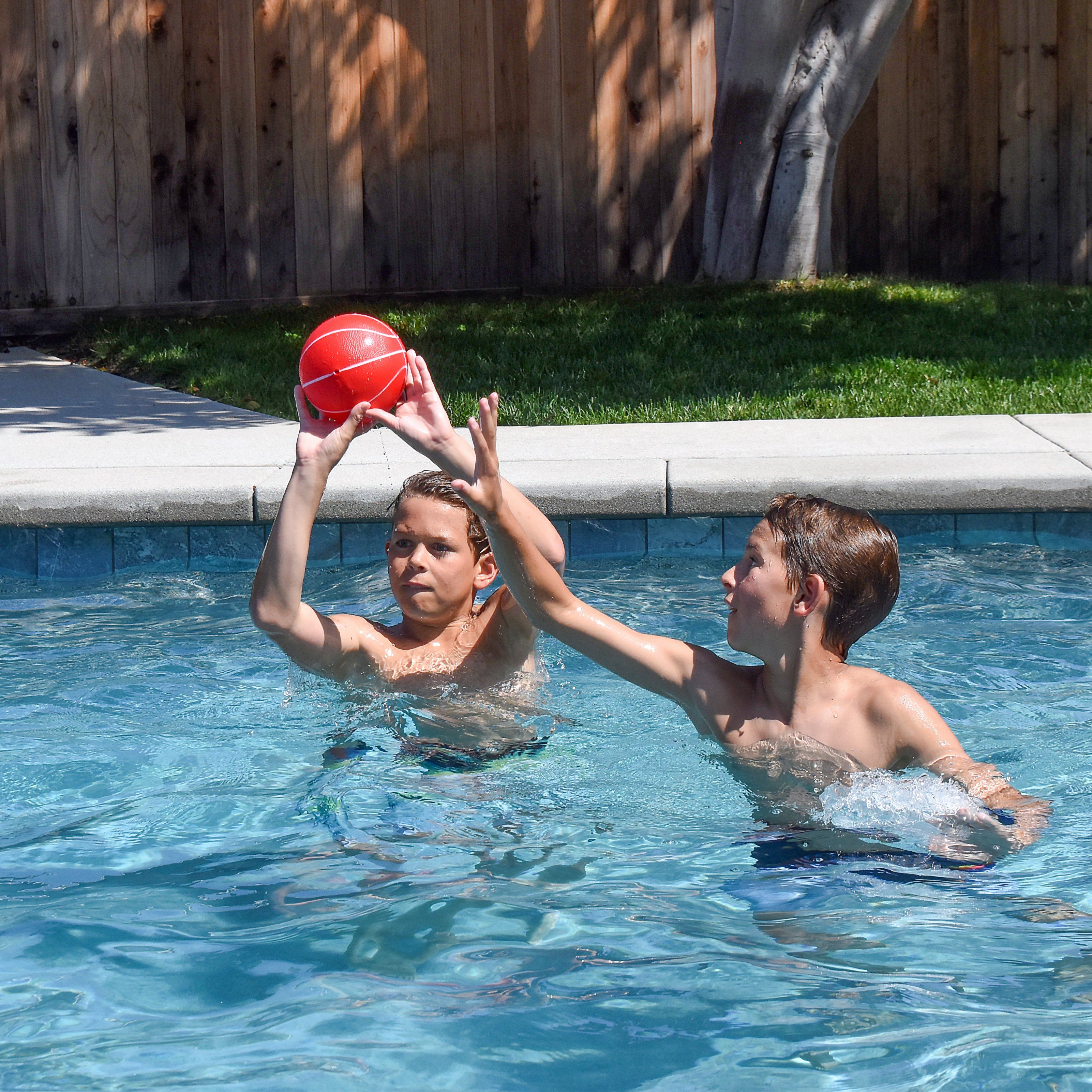 two people playing with a frc in a pool