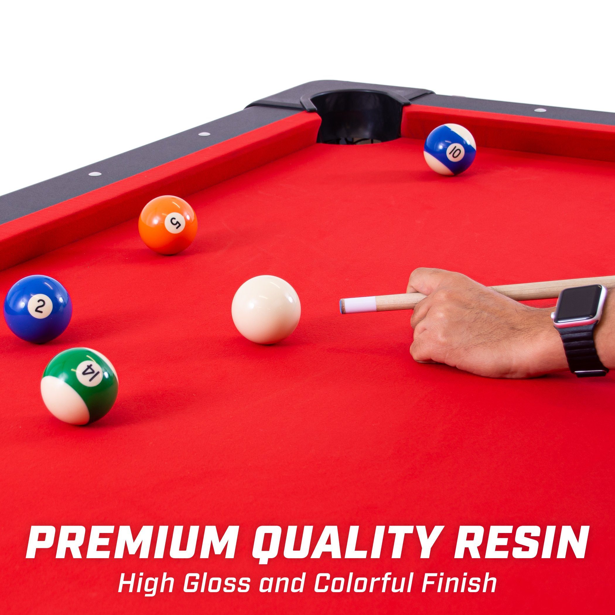 a man is playing pool with balls and a cue