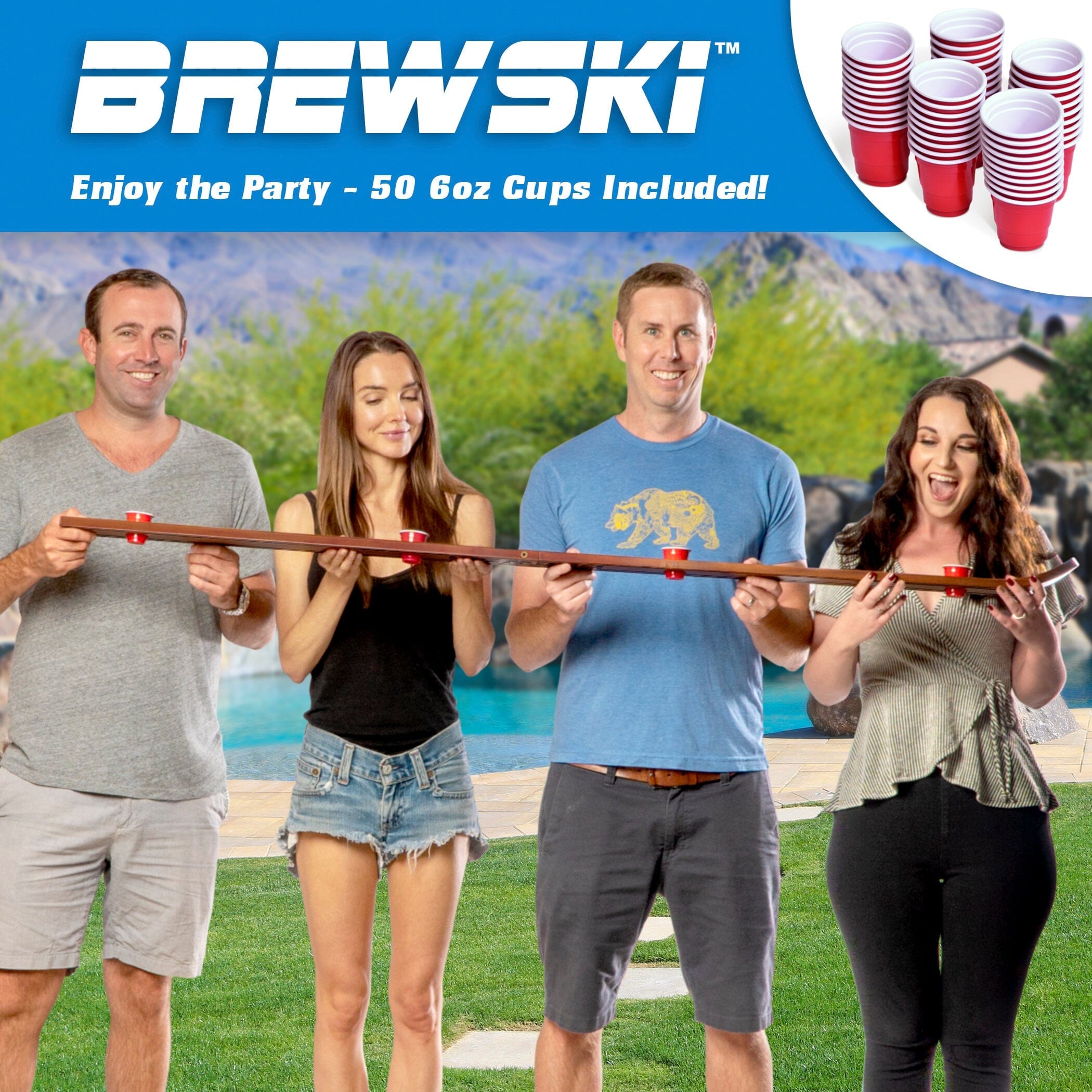 a group of people standing around a pool