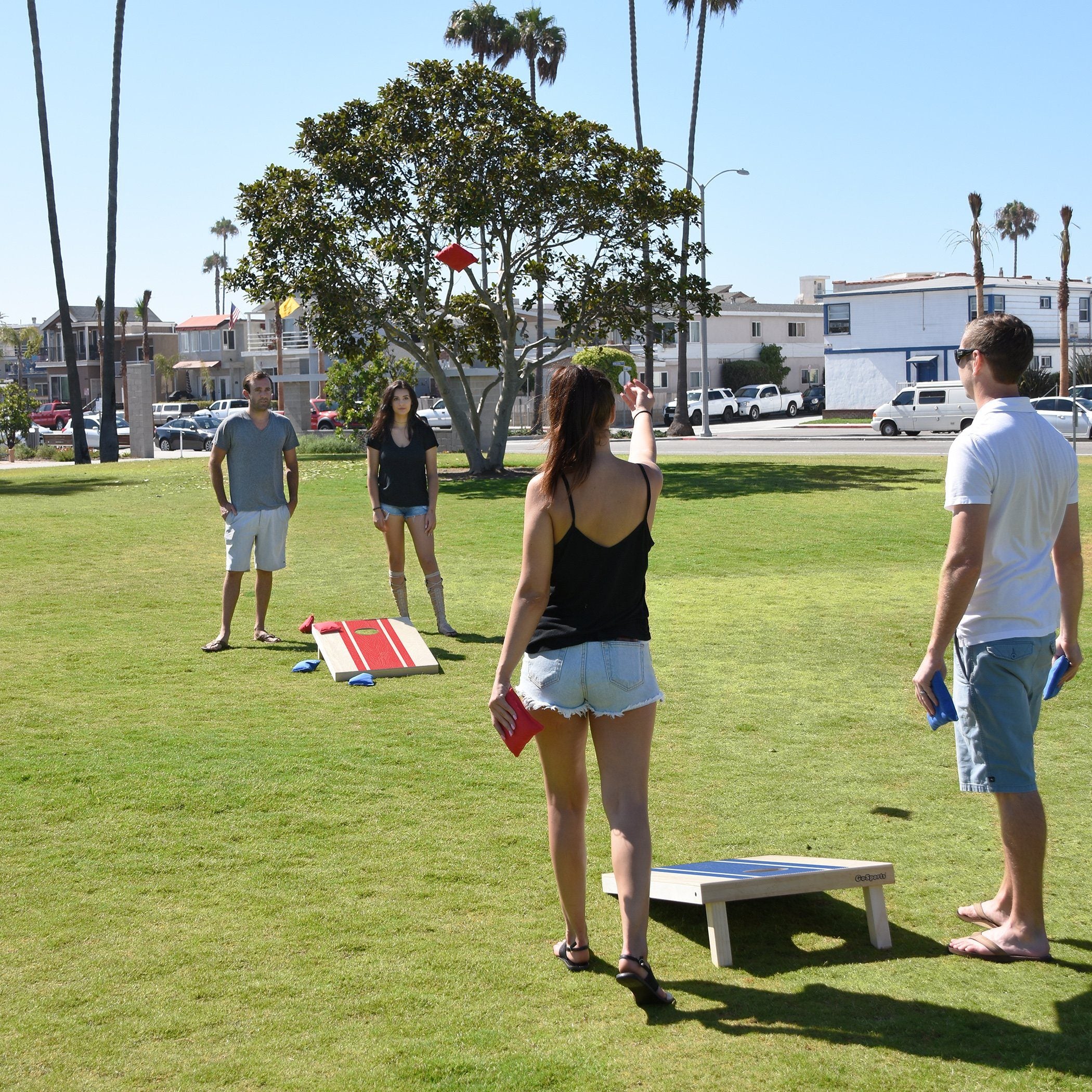 a group of people playing corn corn corn game