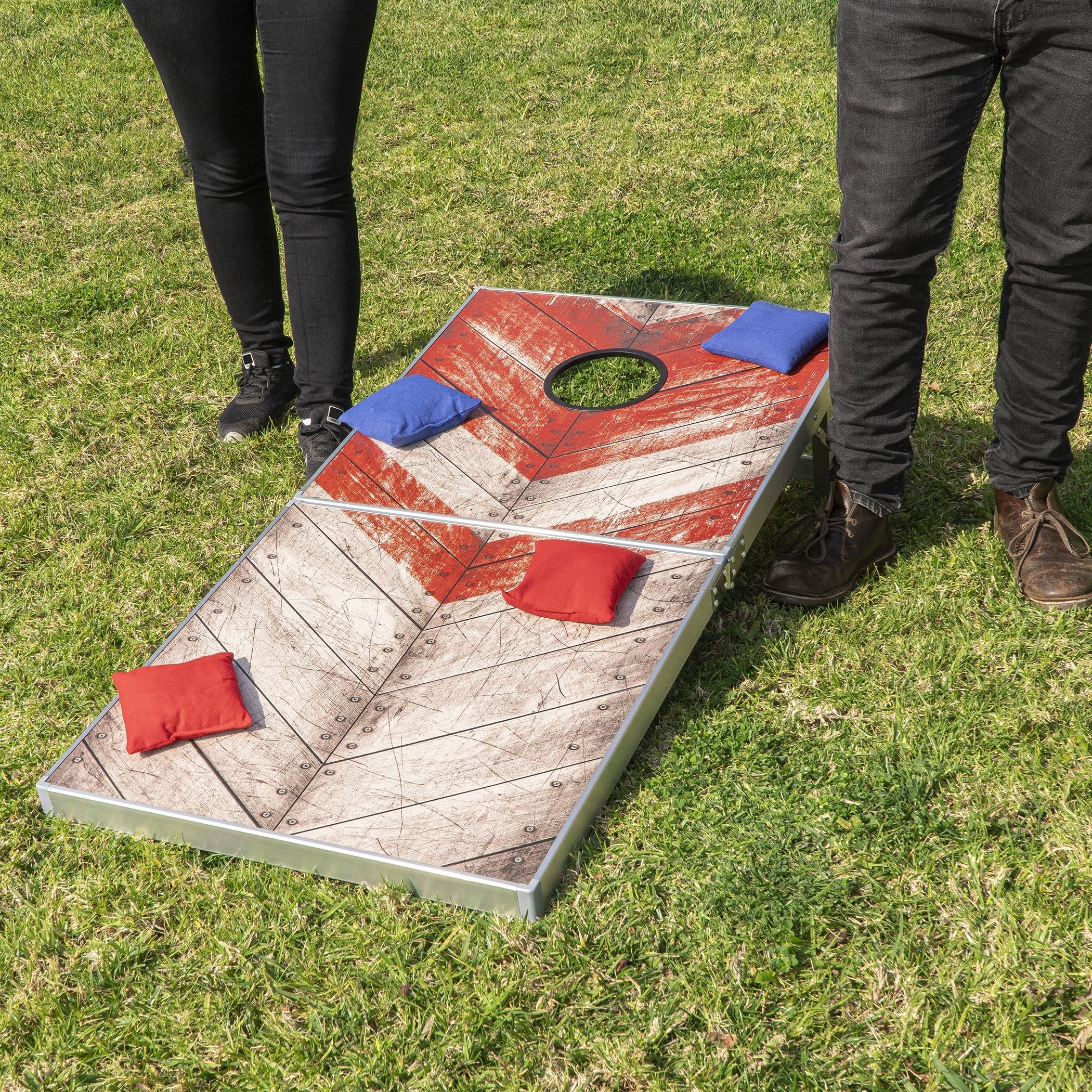 a man and woman standing next to a giant corno