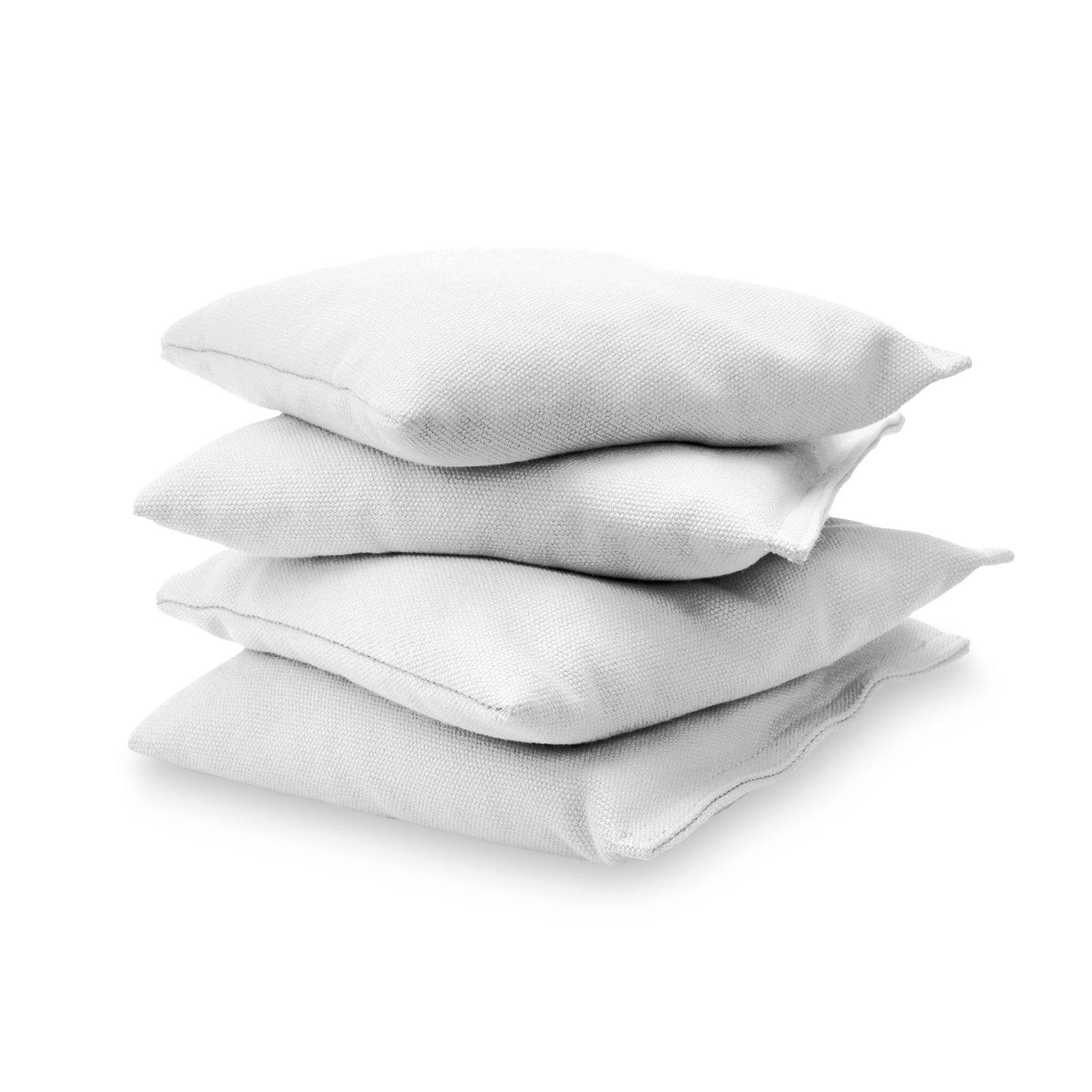 three pillows on a white background