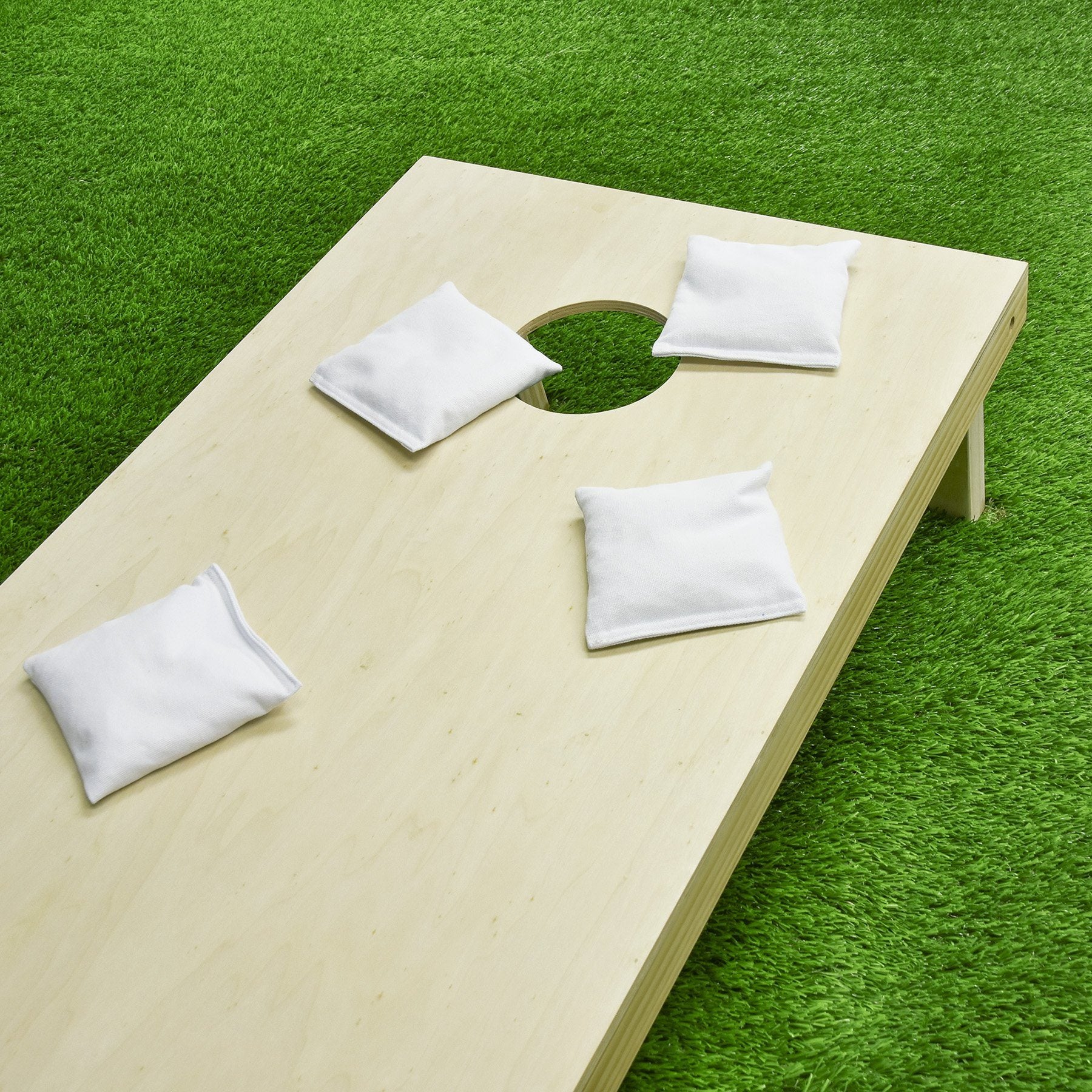 a wooden table with a white cloth on it