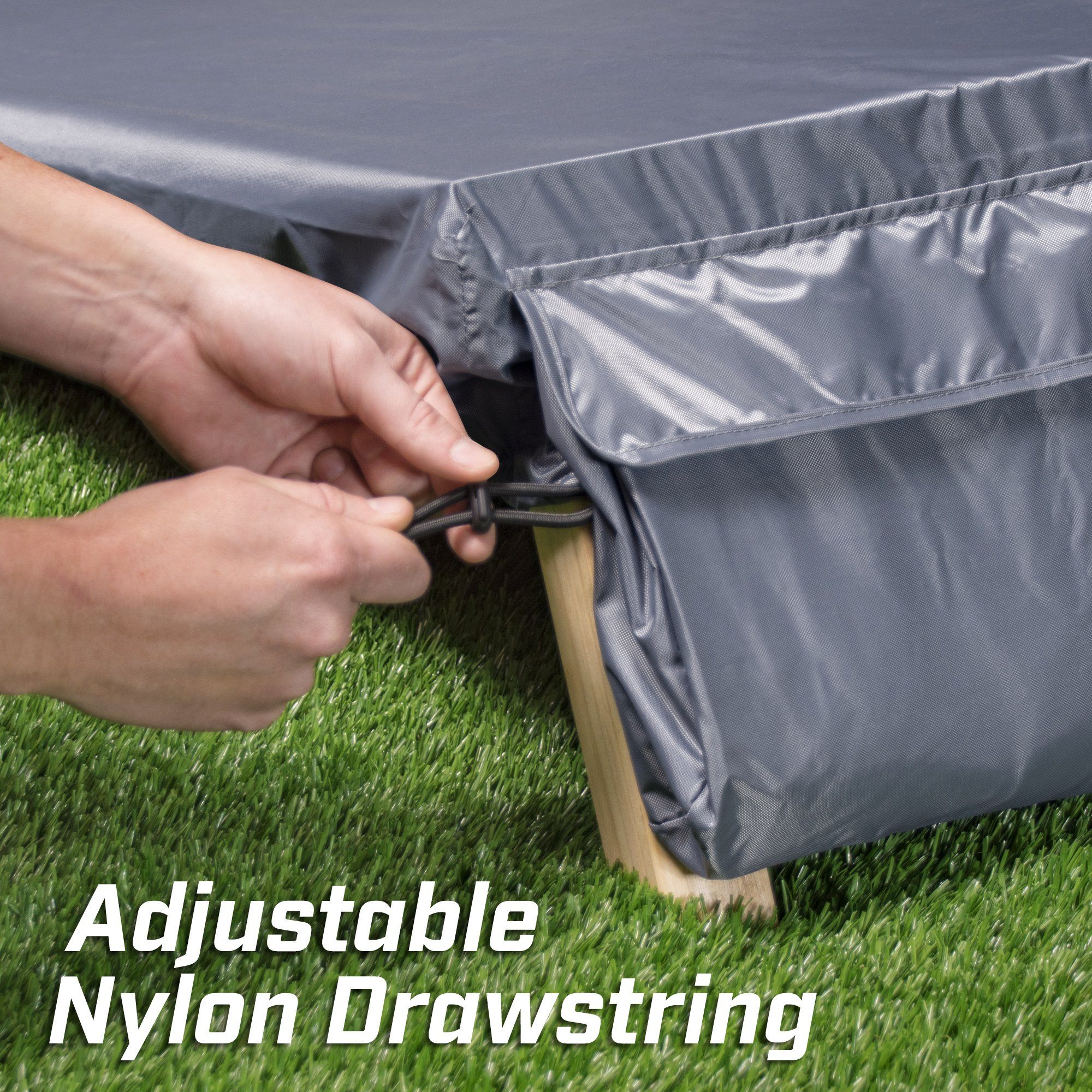 a person is putting a bag in the grass