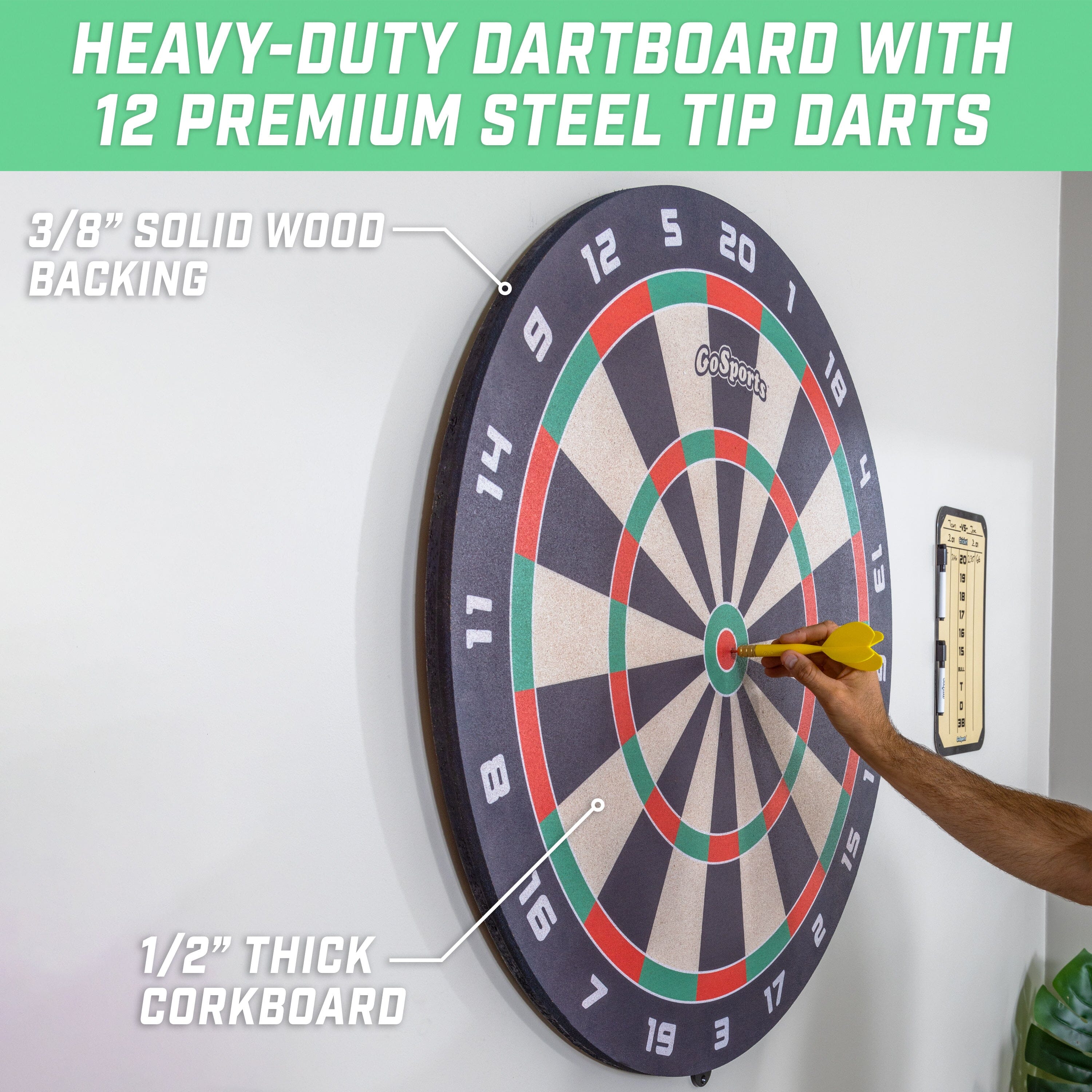 a man is holding a dart in front of a dart