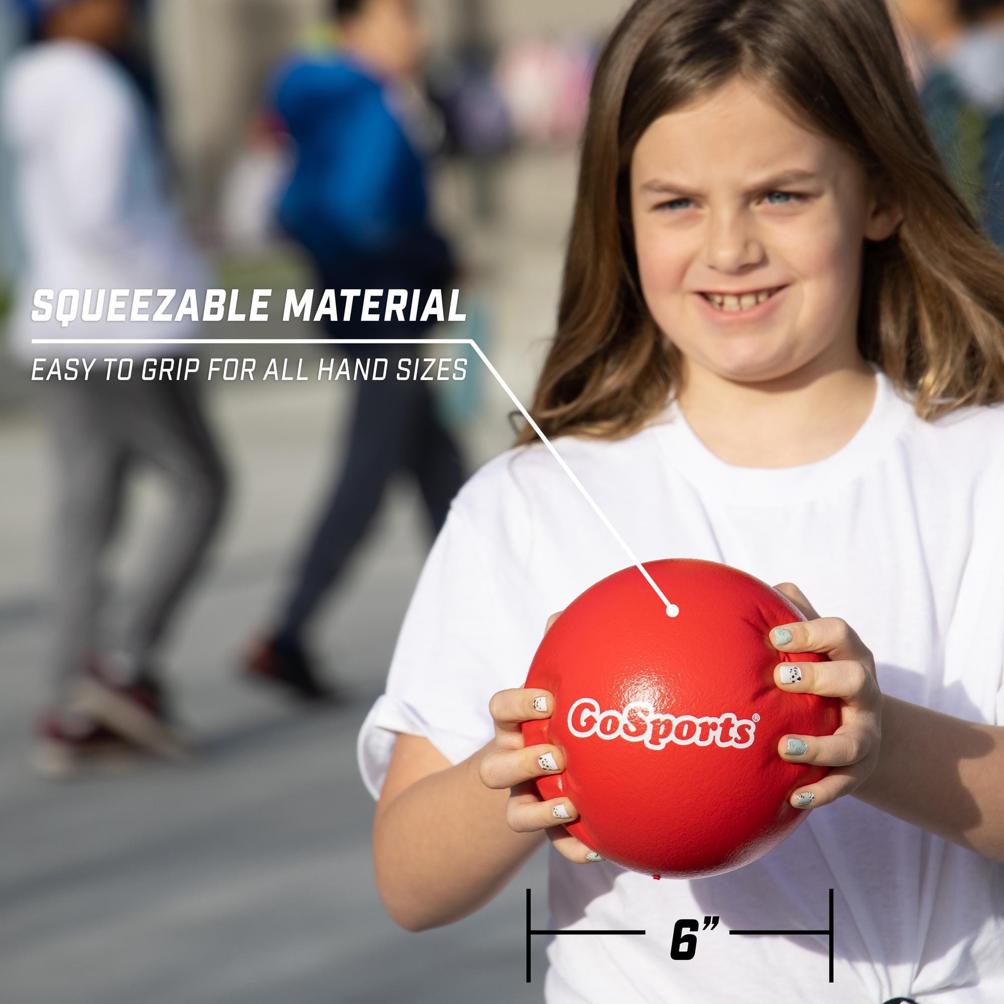 a girl holding a red ball with a white stick