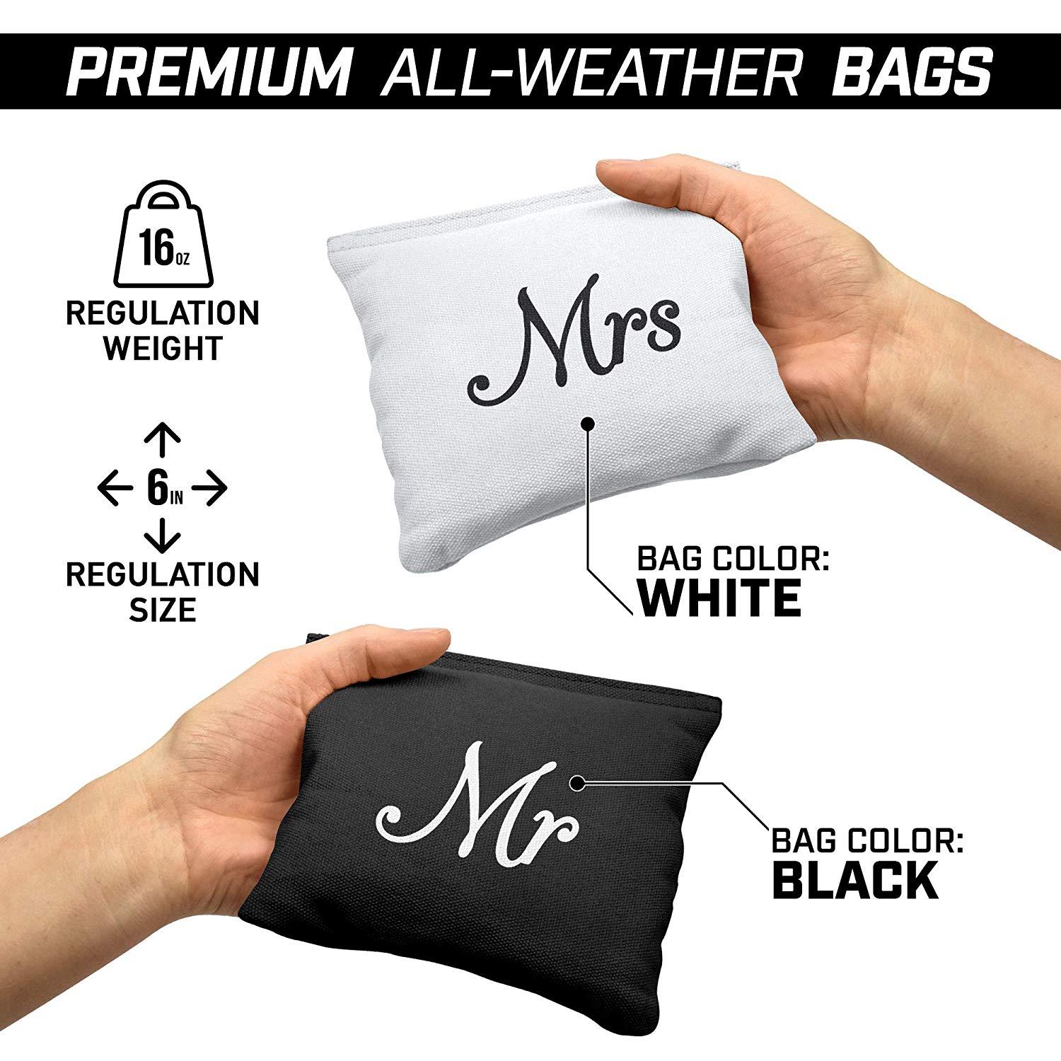 a hand holding a black and white bag with the words ' premium '