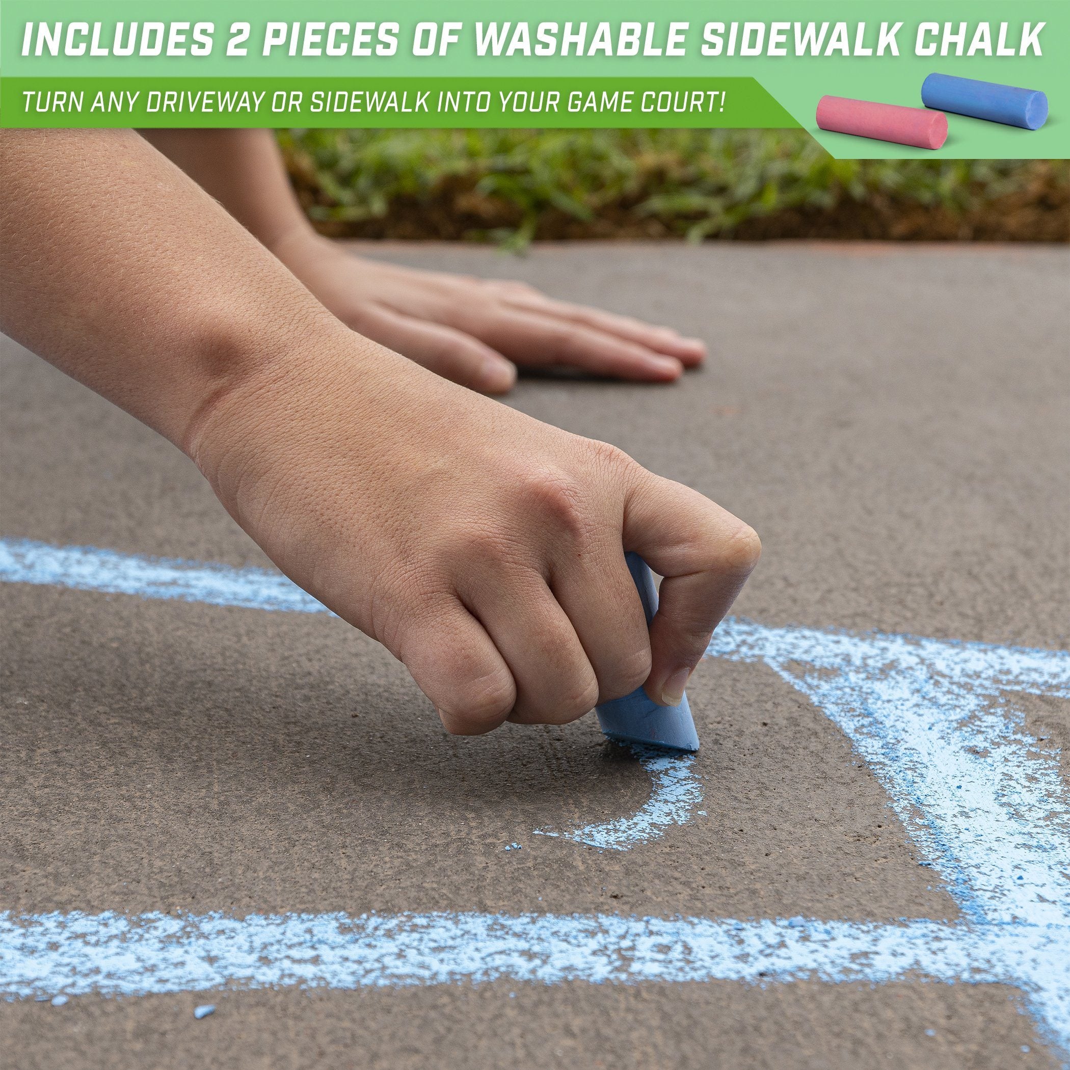 a child ' s hand is drawing a chalk drawing on the sidewalk