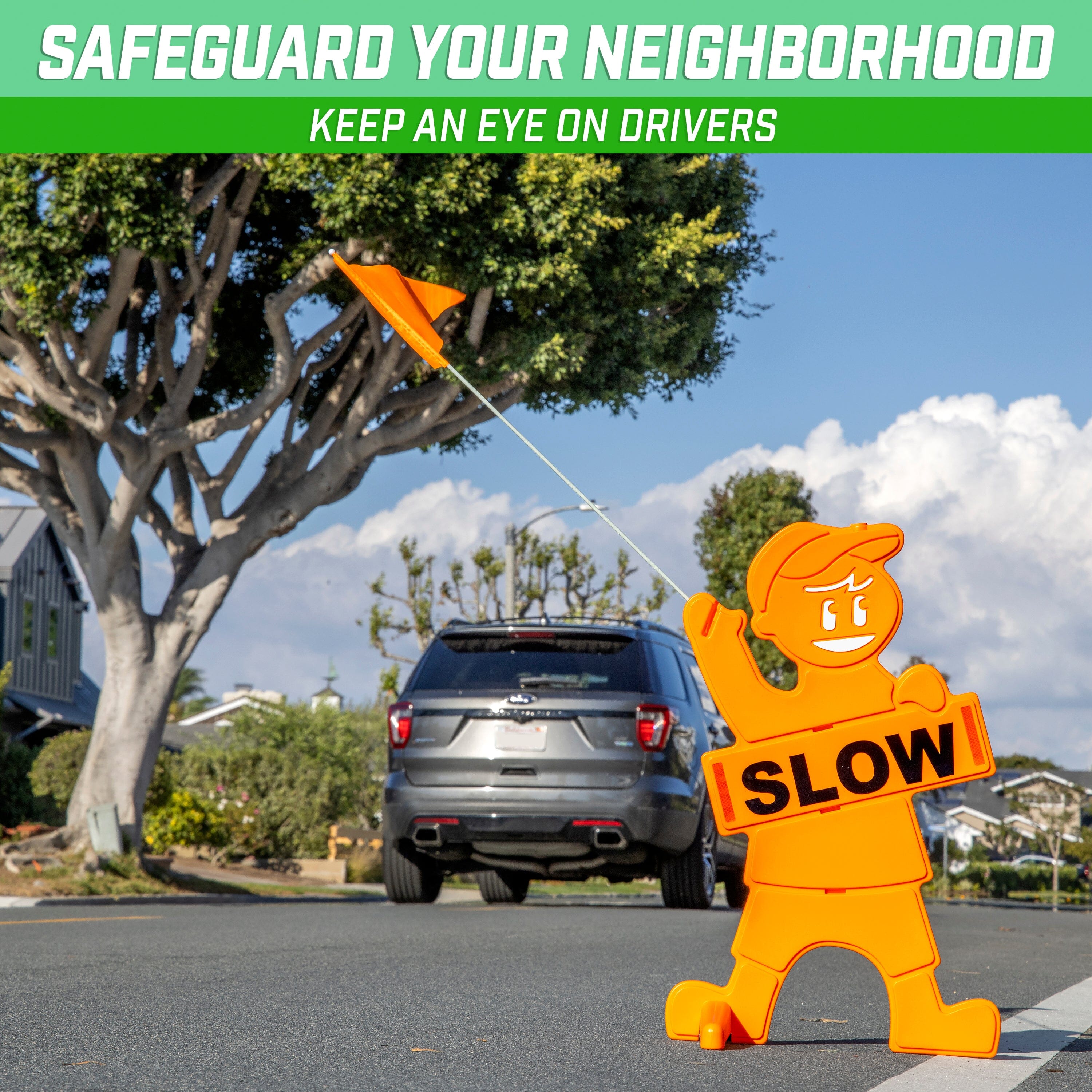 a toy figure is holding a sign in the street