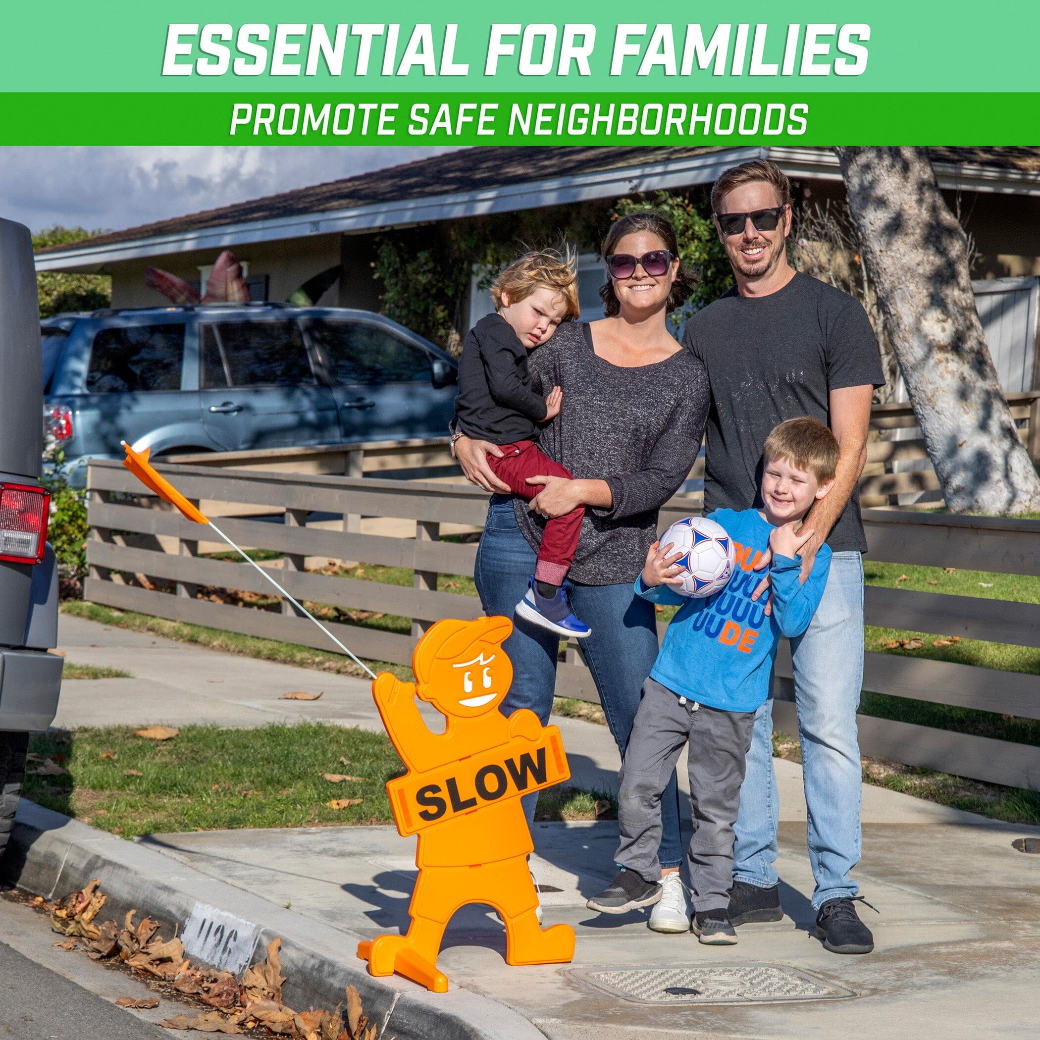 a family poses for a picture with a toy bear
