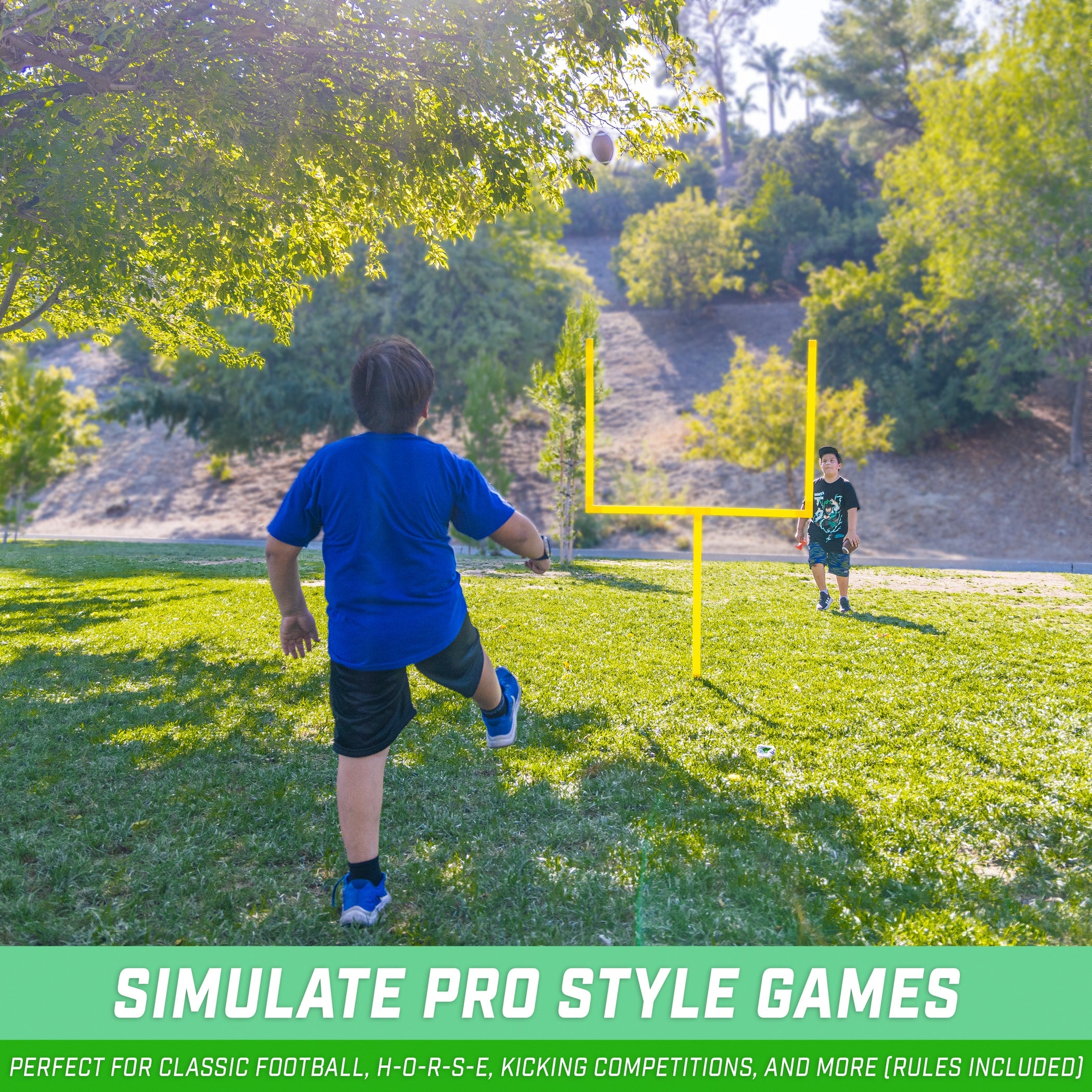 a young boy playing with a soccer ball in the grass