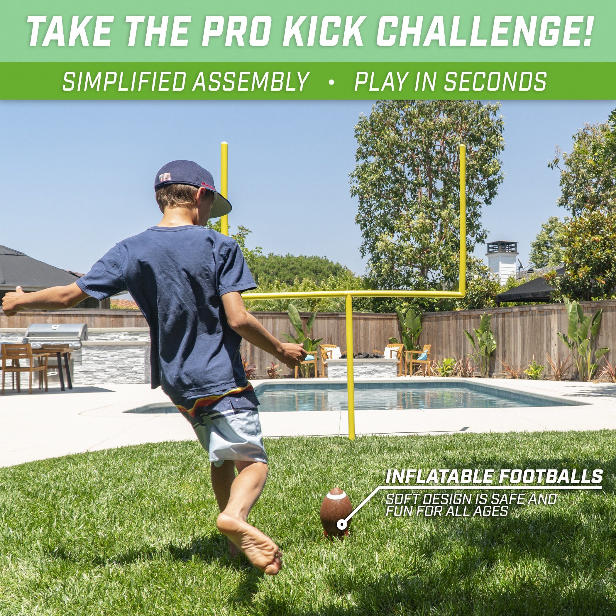 a boy kicking a football ball in a backyard